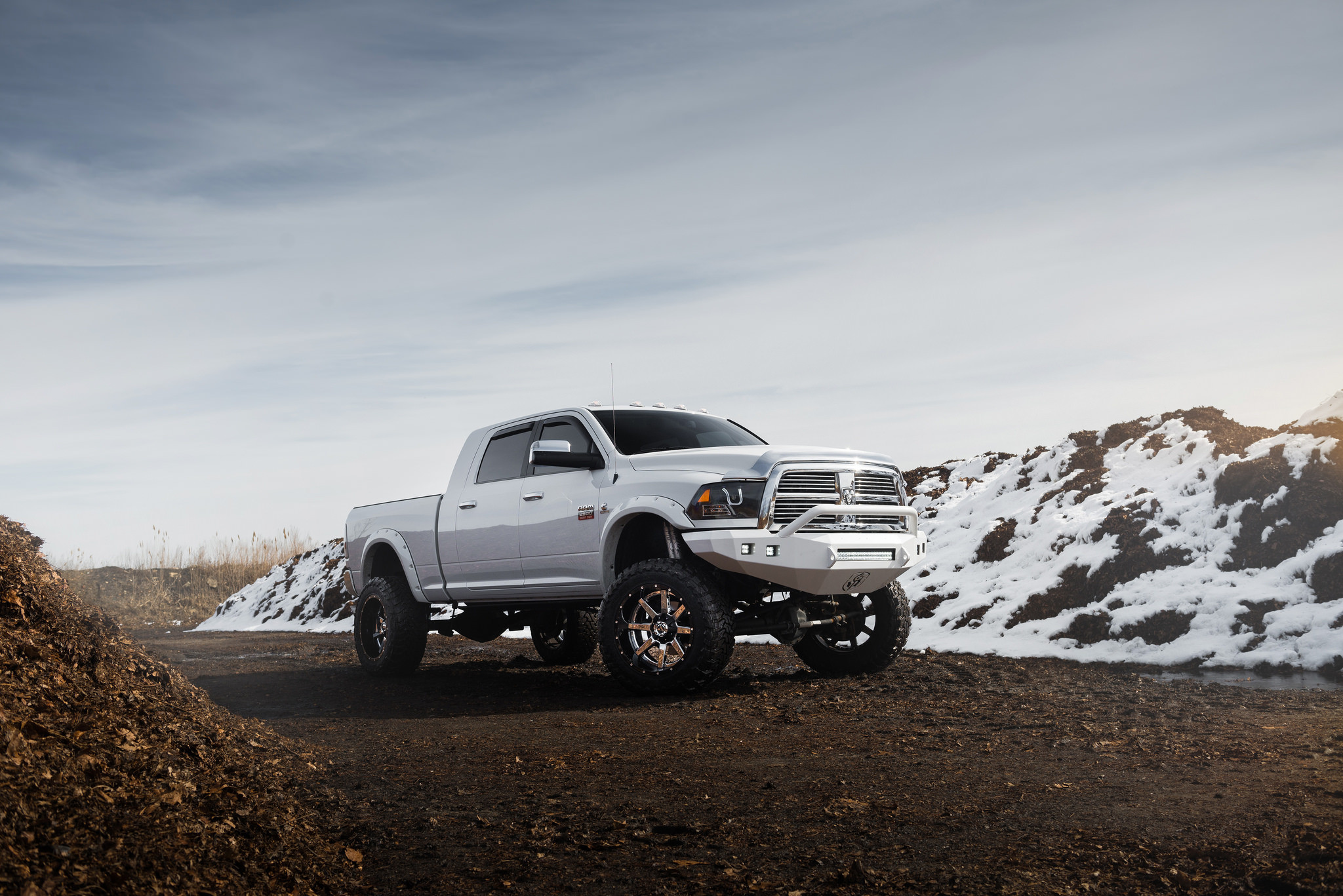 Front Bumper with LED Light Bar on White Dodge Ram - Photo by Fuel Offroad