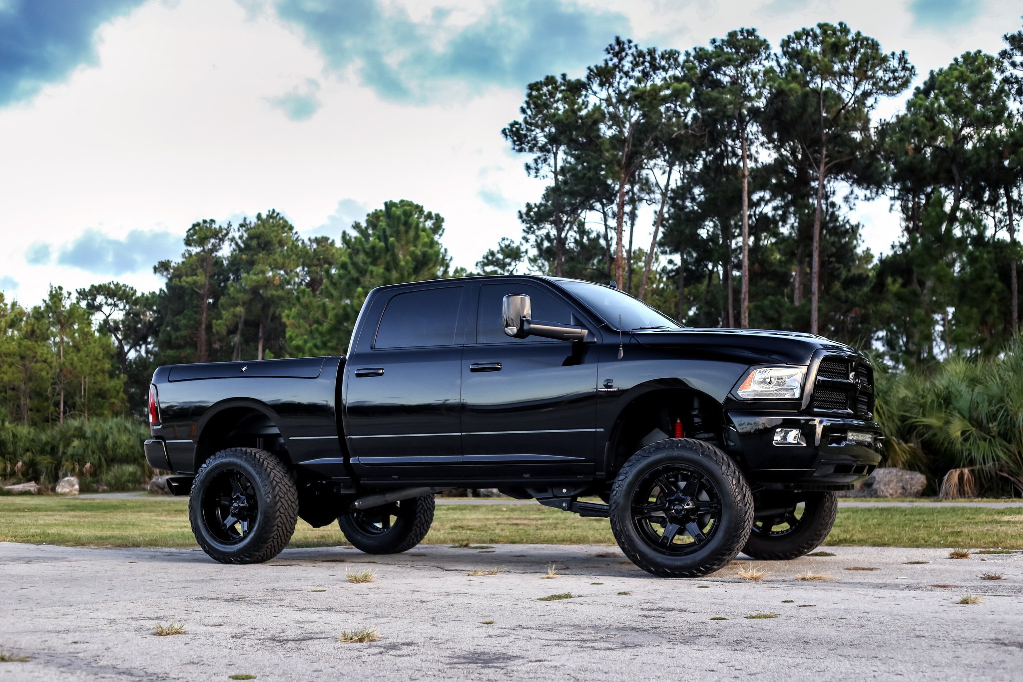 Lifted Dodge Ram With Custom Touches and Colormatched Fuel Wheels.