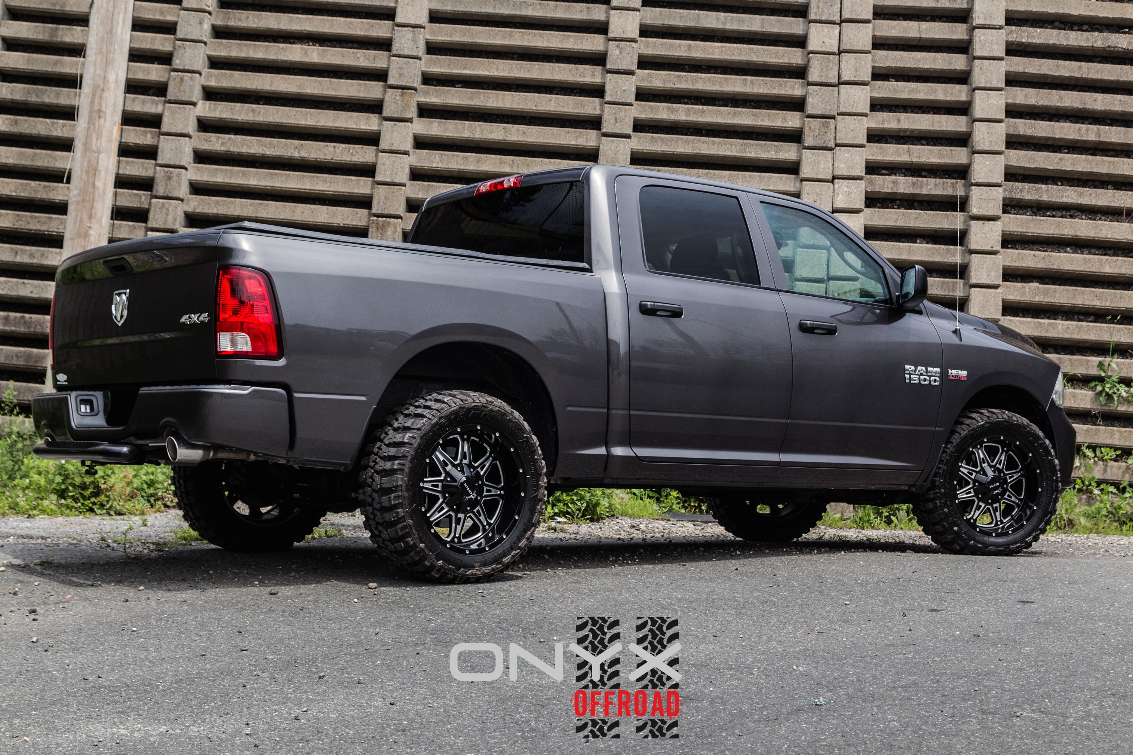 Gray Dodge Ram with Afterfmarket Exhaust System - Photo by Onyx Offroad