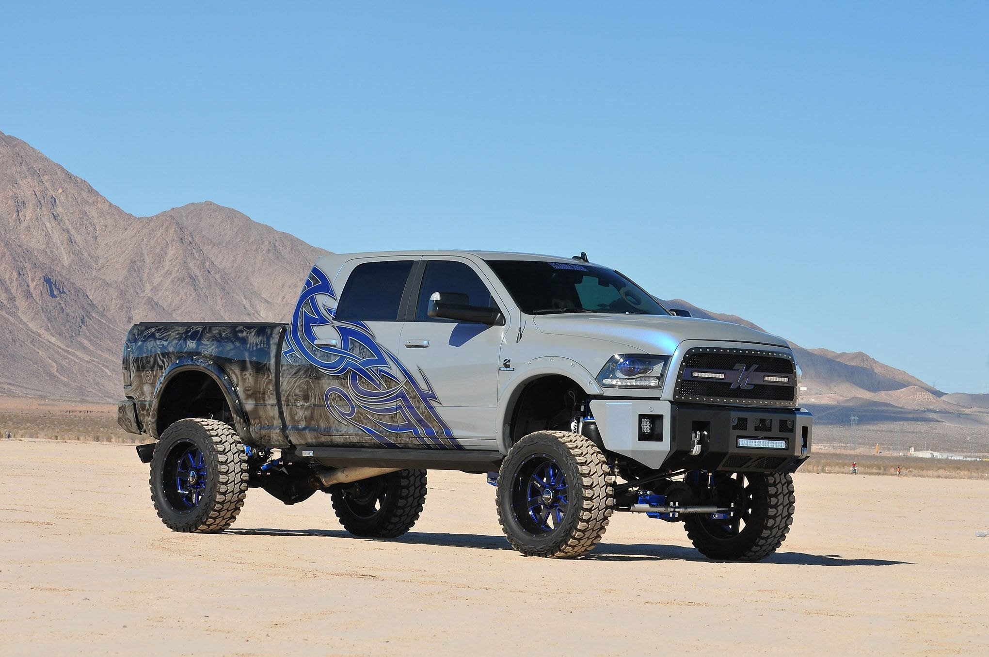 Unique Black Graphics and Custom Body Parts Spotted on Lifted Ram |  CARiD.com Gallery, image size:2040x1355