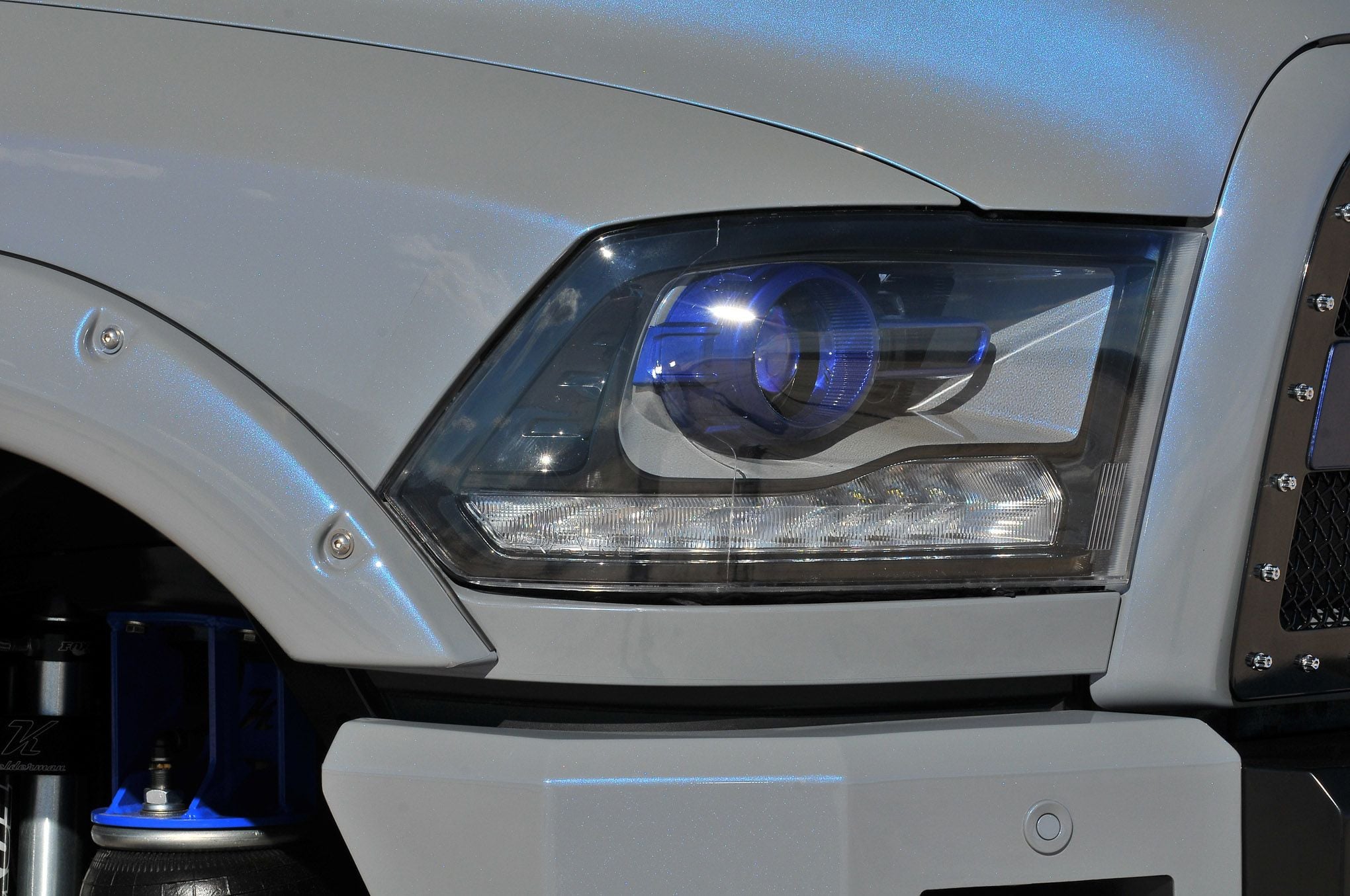 Aftermarket Headlights on Airbrushed Lifted Dodge Ram - Photo by Phil Gordon