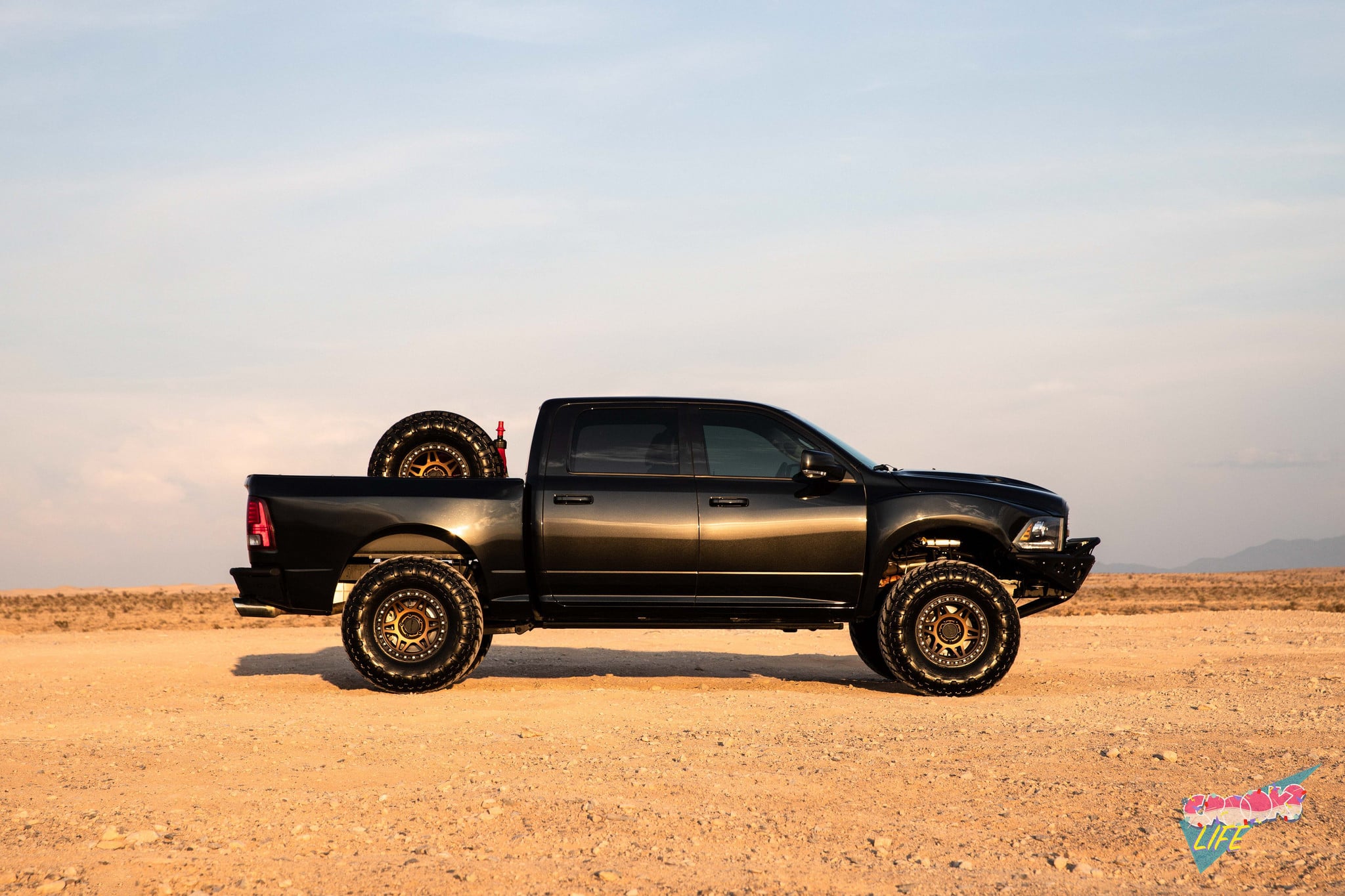 Custom Running Boards on Black Dodge Ram - Photo by Jimmy Crook