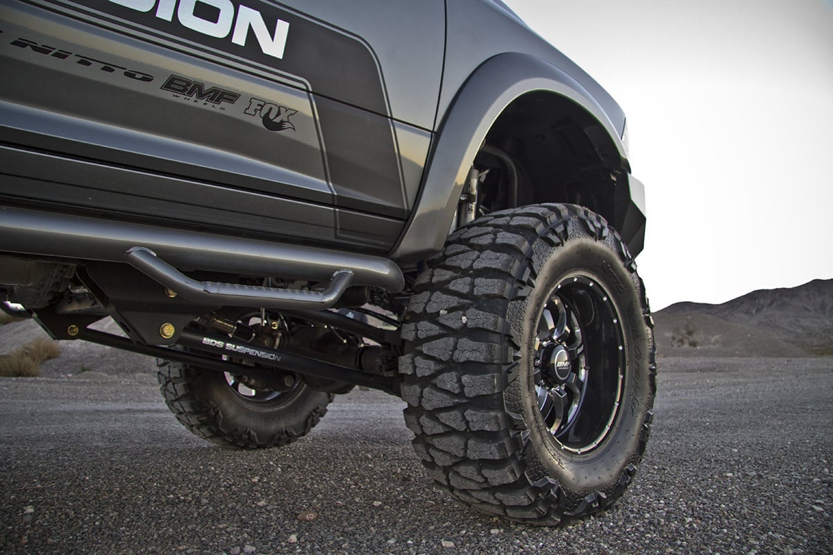 Side bars with drop steps on lifted Dodge Ram truck - Photo by BDS Suspensions