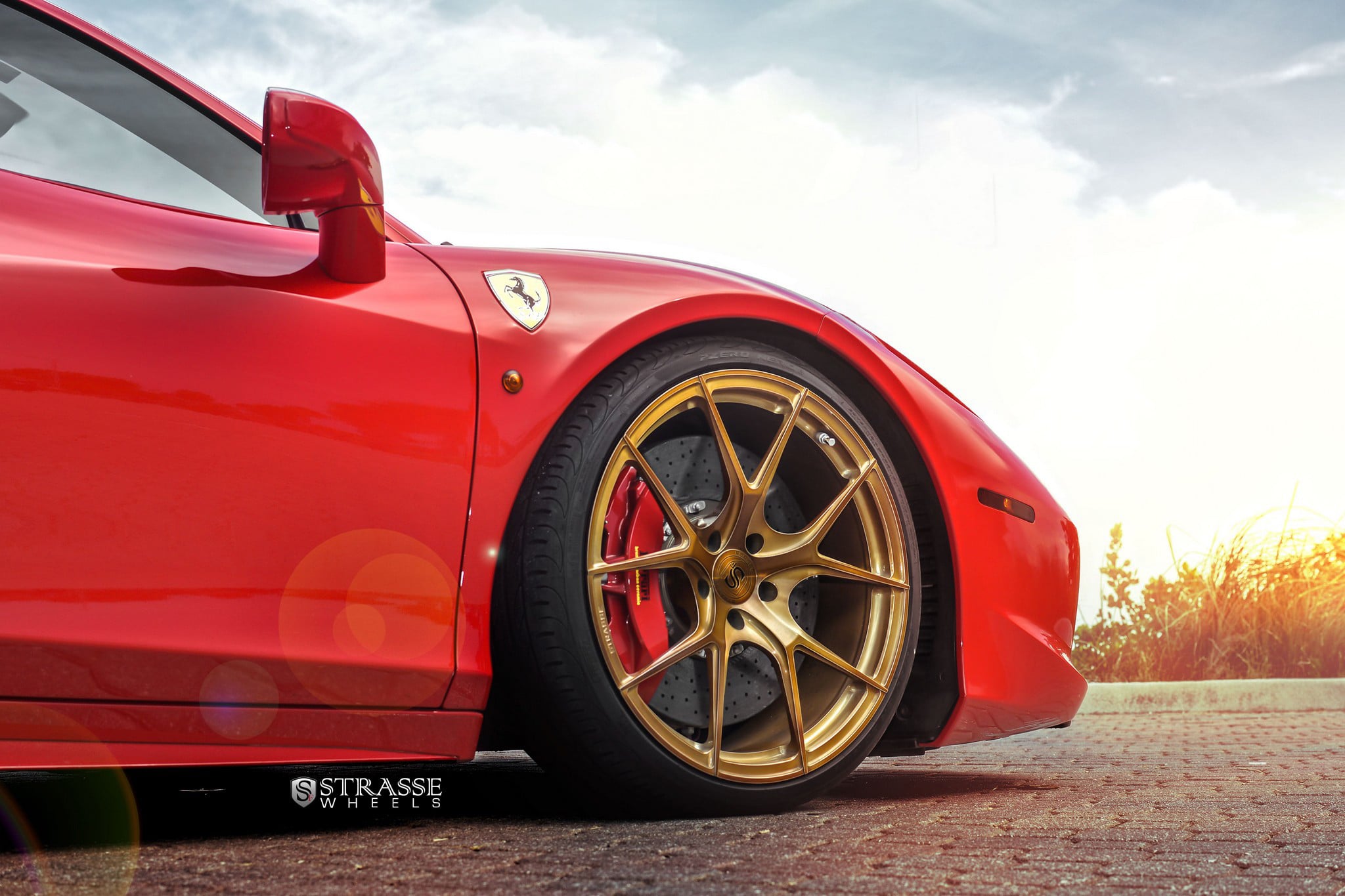 Brushed Bronze Strasse Rims on Red Ferrari 458 - Photo by Strasse Forged