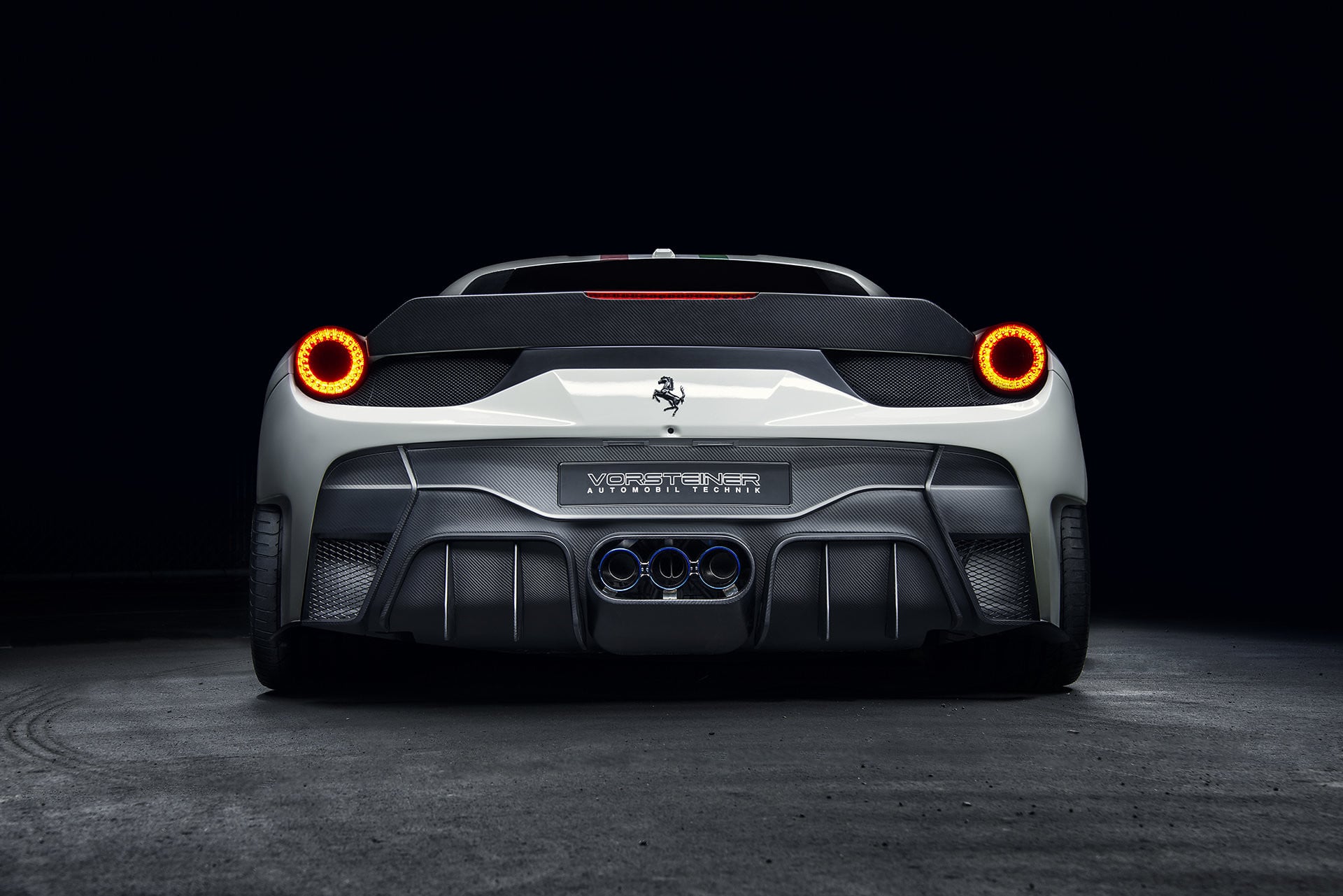 White Ferrari 458 with Aftermarket Carbon Fiber Rear Diffuser - Photo by Vorstiner