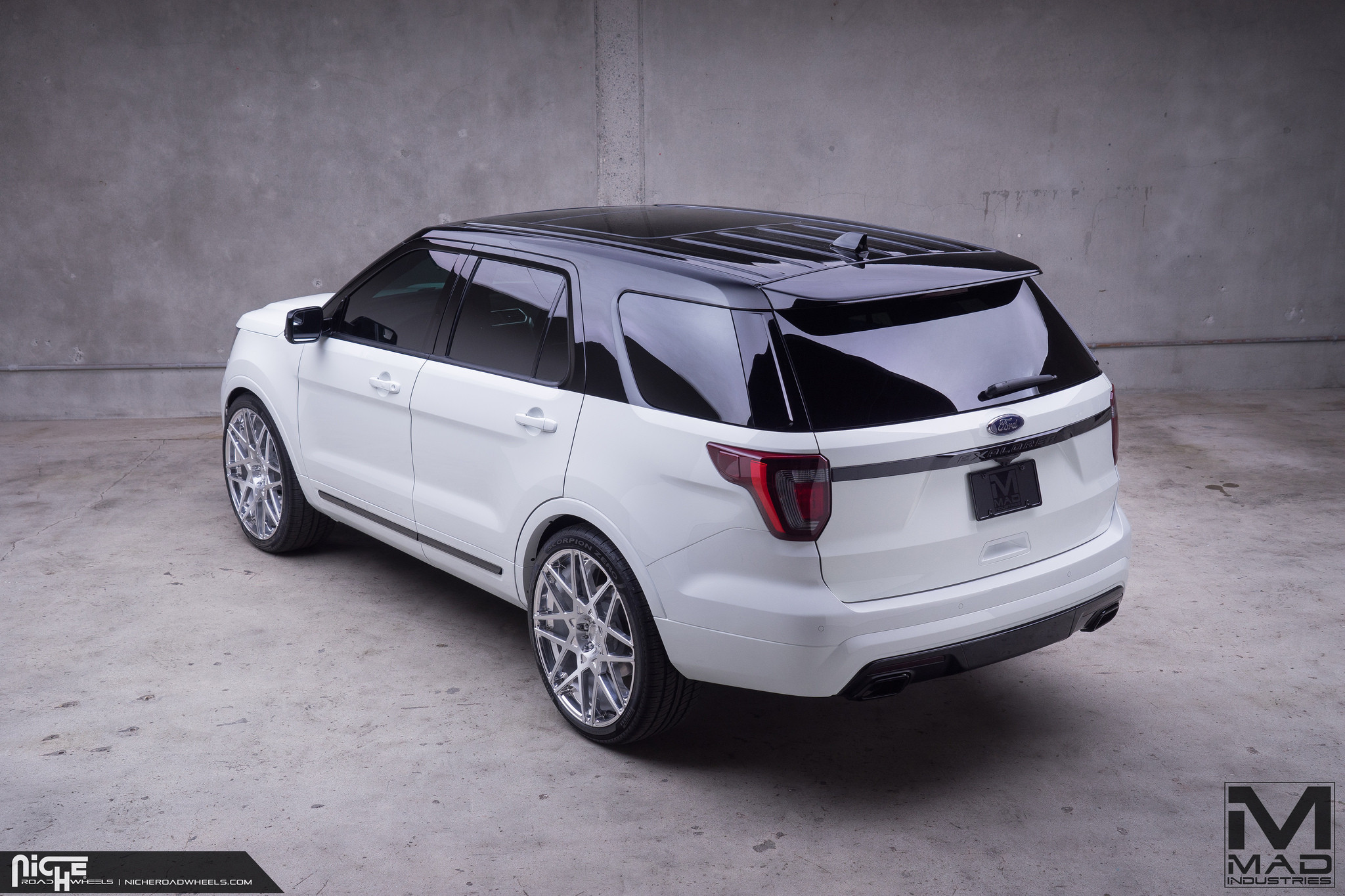 Ford Explorer With Smoked Rims - Photo by Niche