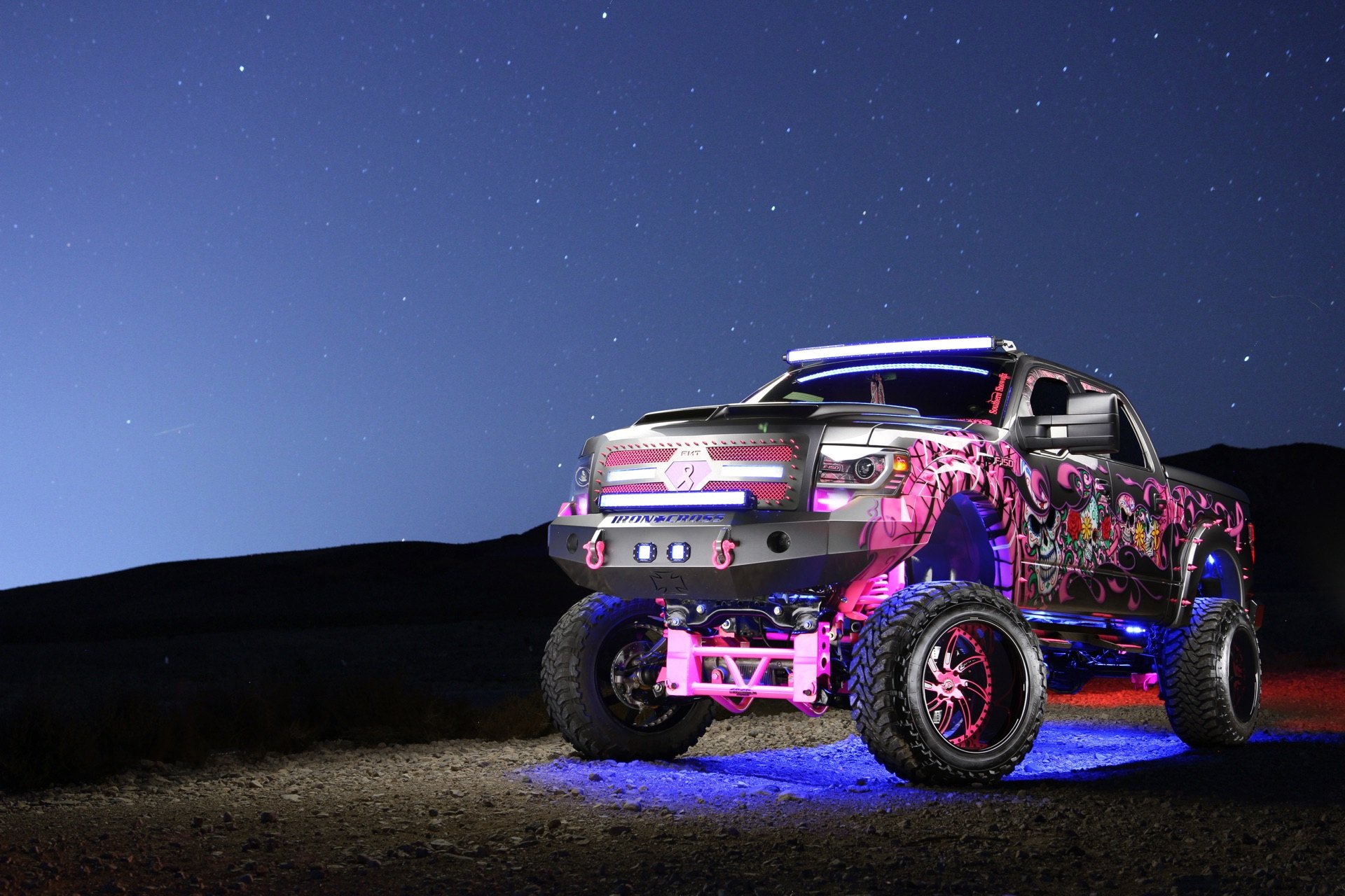 F150 With a Massive Lift and Crazy Pink Graphics.