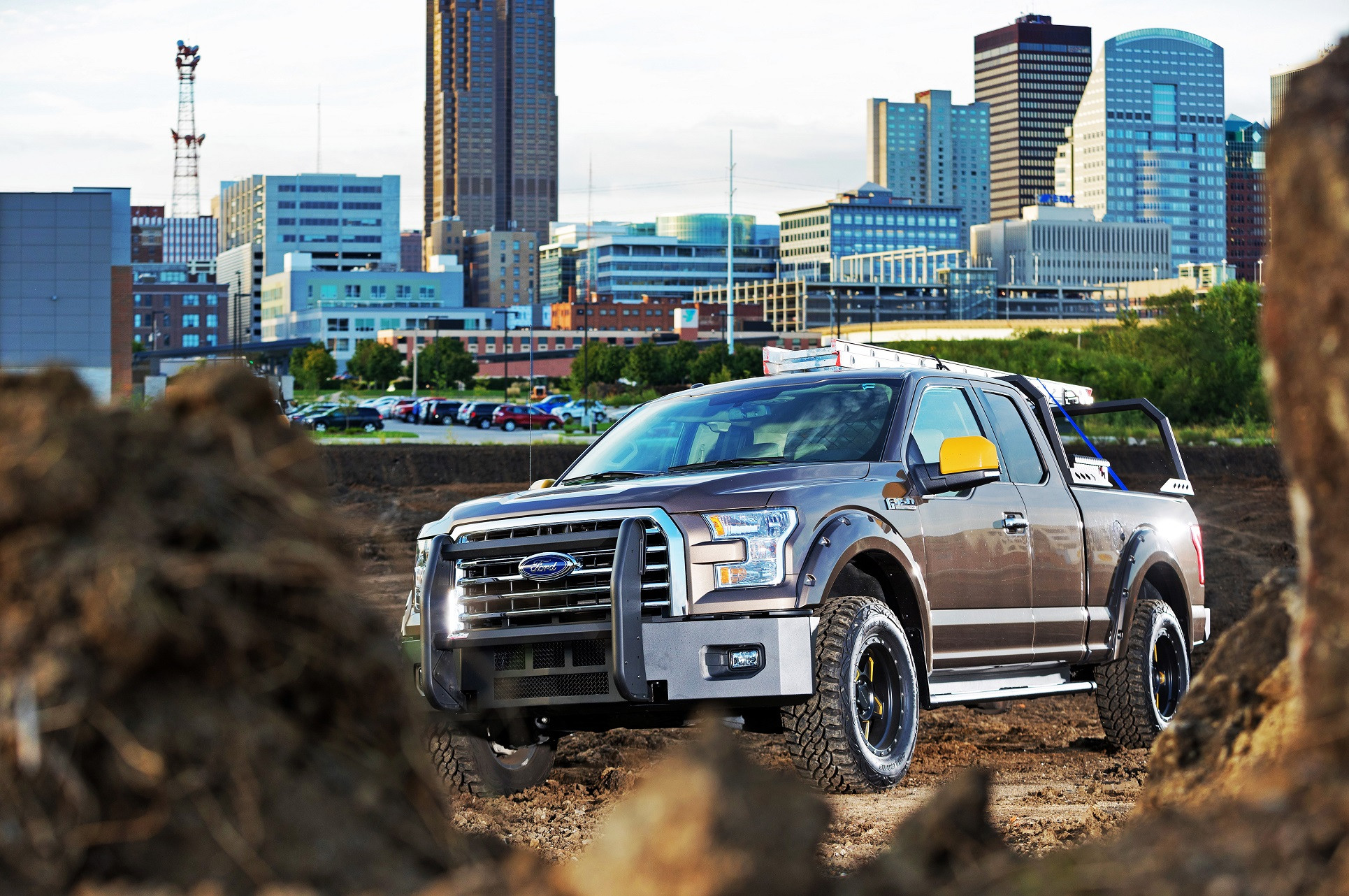 Brown Ford F150 With Yellow Mirror Caps - Photo by Dee Zee