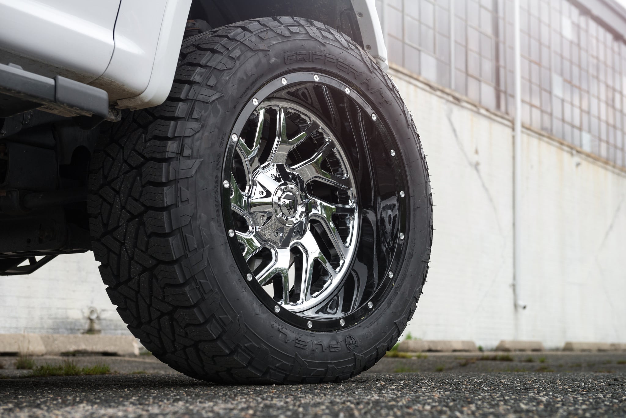 White Lifted Ford F-150 with Triton Fuel Offroad Rims - Photo by Fuel Offroad