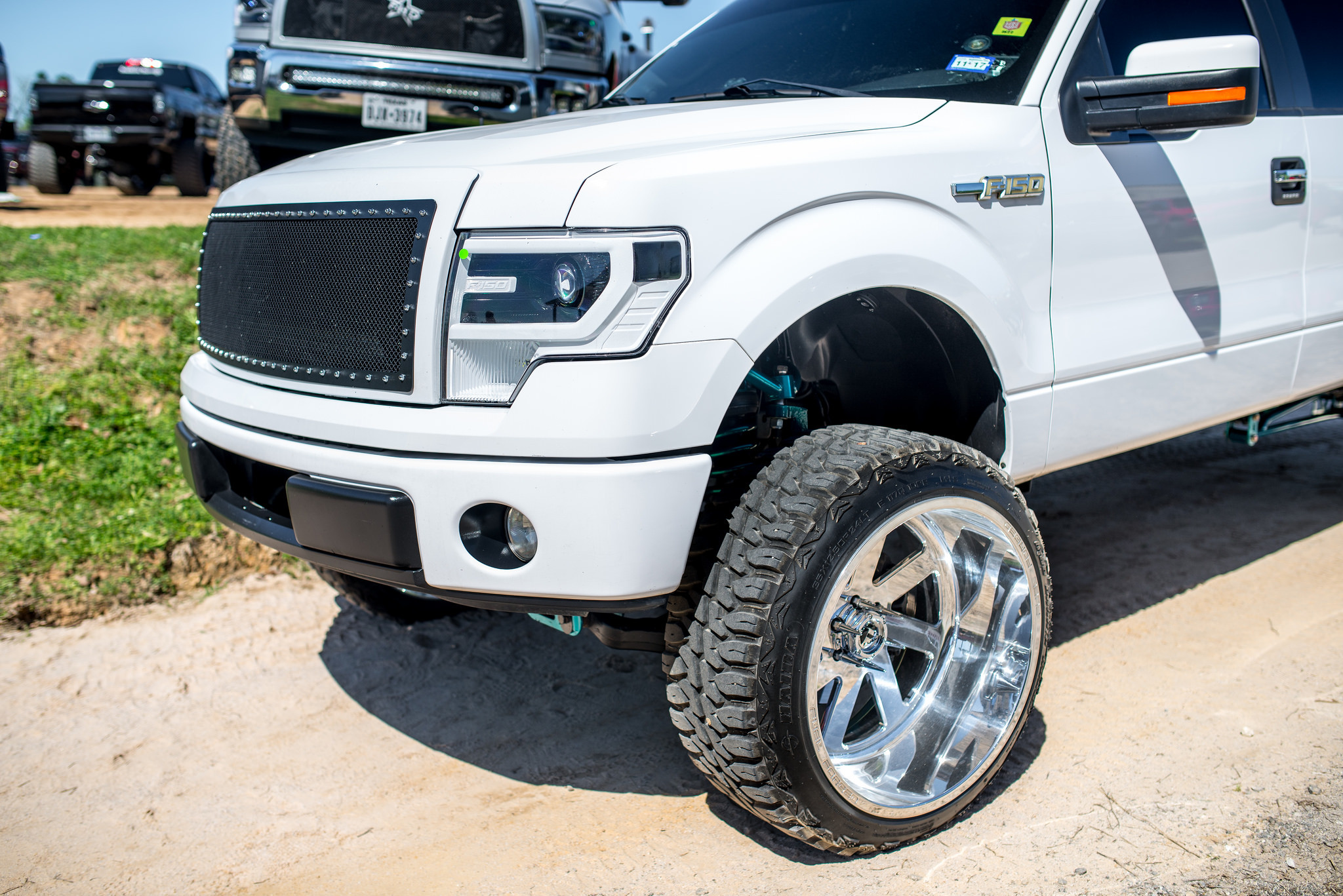 Aftermarket Headlights on White Ford F-150 - Photo by Fuel Offroad