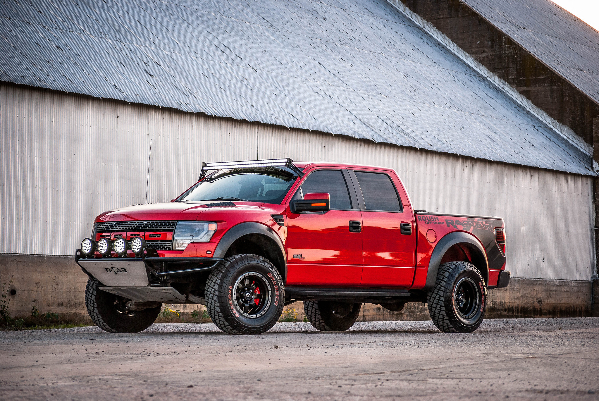 Red Ford F-150 Raptor with N-Fab Grille Guard - Photo by Fuel Offroad