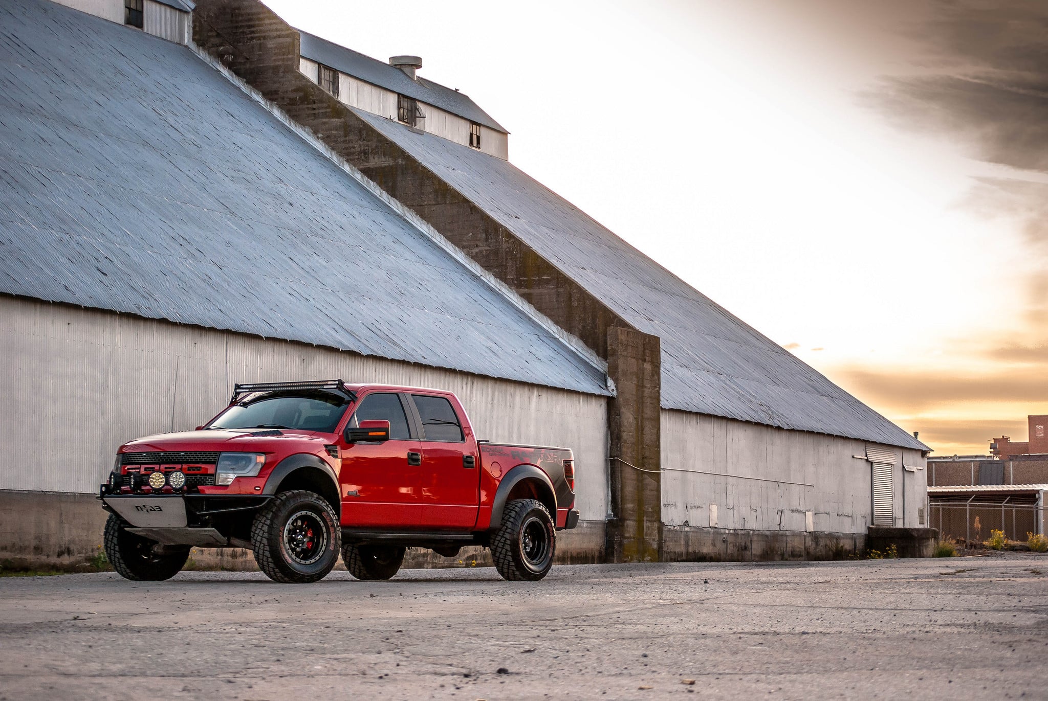 Custom Black Fuel Offroad Wheels on Red Ford F-150 - Photo by Fuel Offroad