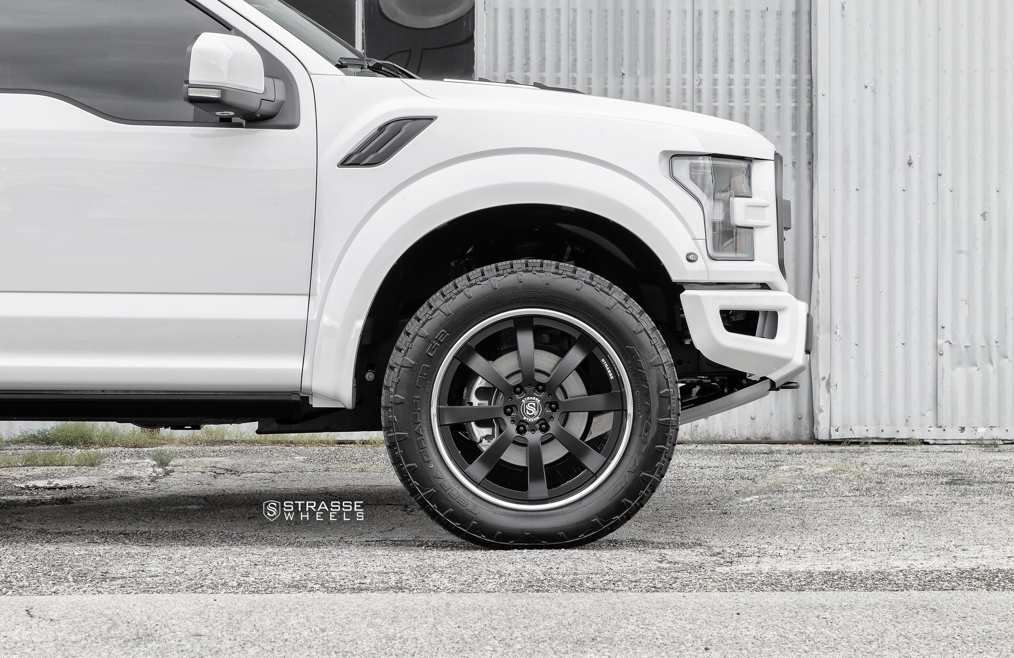 White Lifted Ford F-150 with T8 22 Inch Strasse Rims - Photo by Strasse Forged