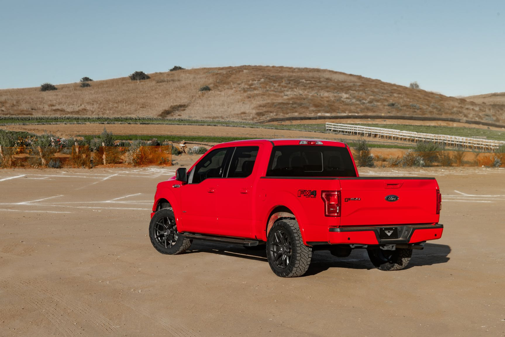 Red Ford F-150 Lariat with Custom Rear Bumper - Photo by Venom Rex