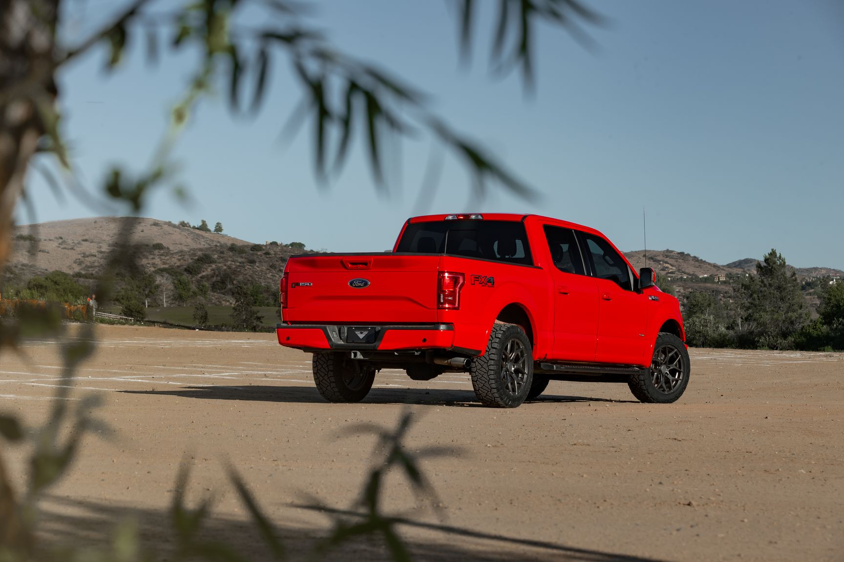 Aftermarket Running Boards on Red Ford F-150 Lariat - Photo by Venom Rex