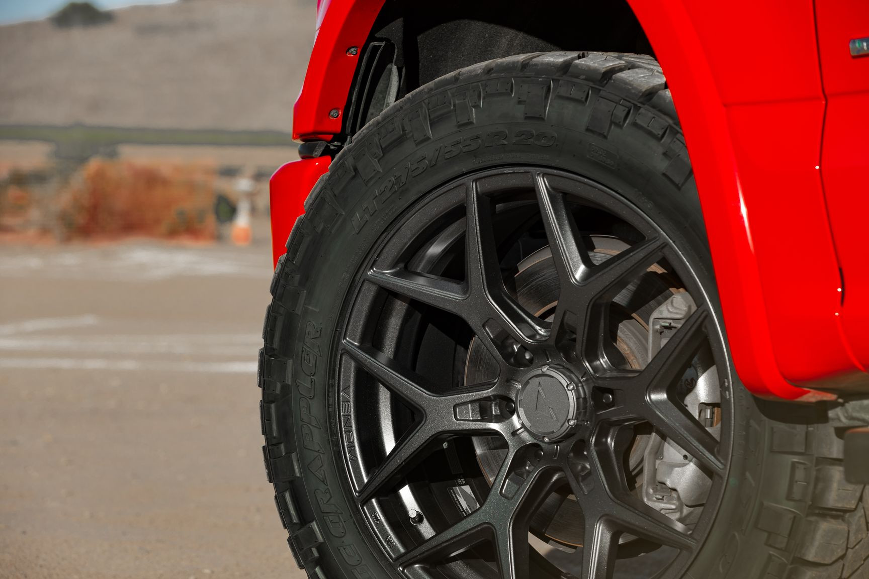 Red Ford F-150 Lariat on Nitto Grapper Tires - Photo by Venom Rex