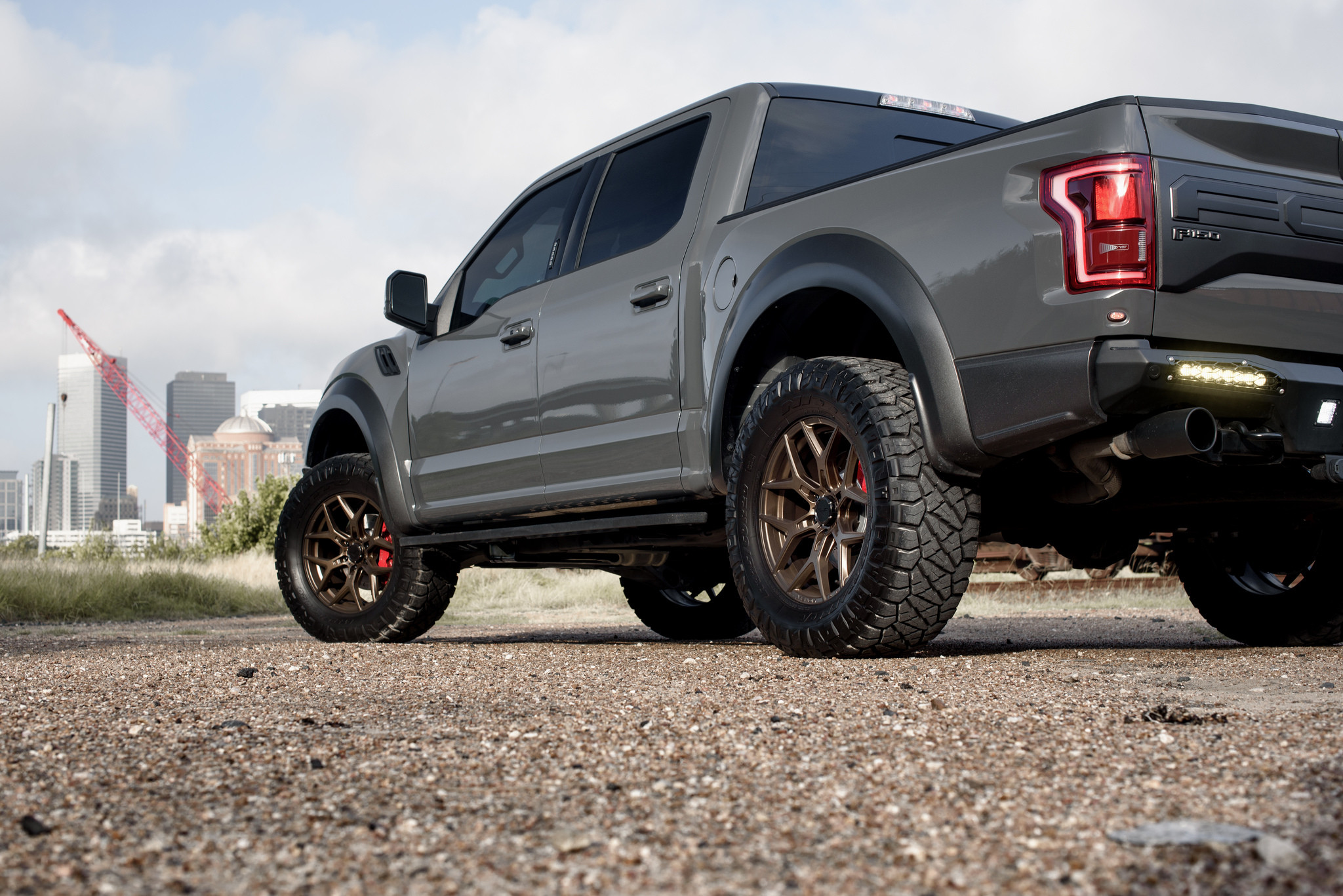 Custom Exhaust System on Gray Ford F-150 Raptor - Photo by Venom Rex