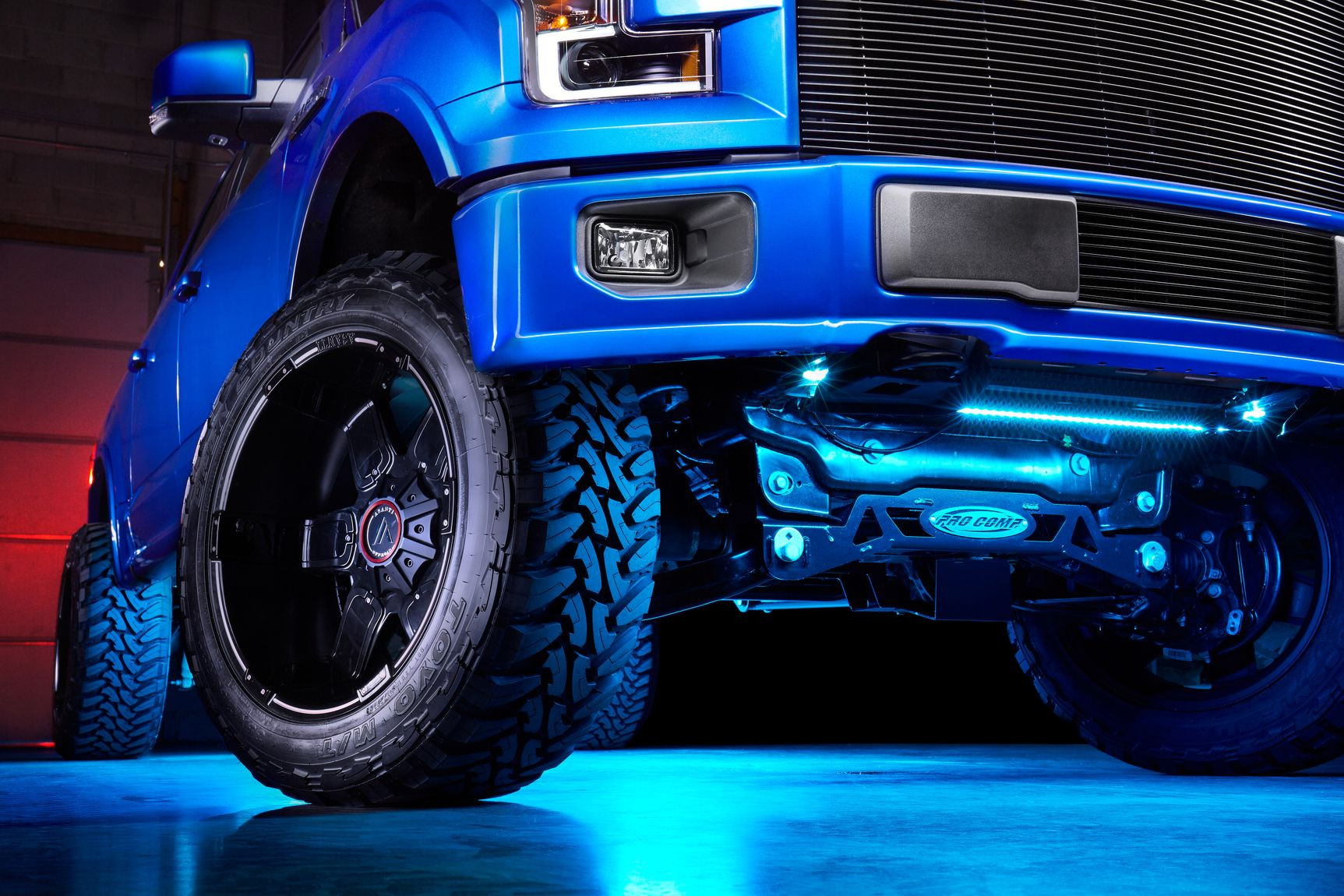 Underbody LED Kit on Blue Lifted Ford F-150 - Photo by CARiD