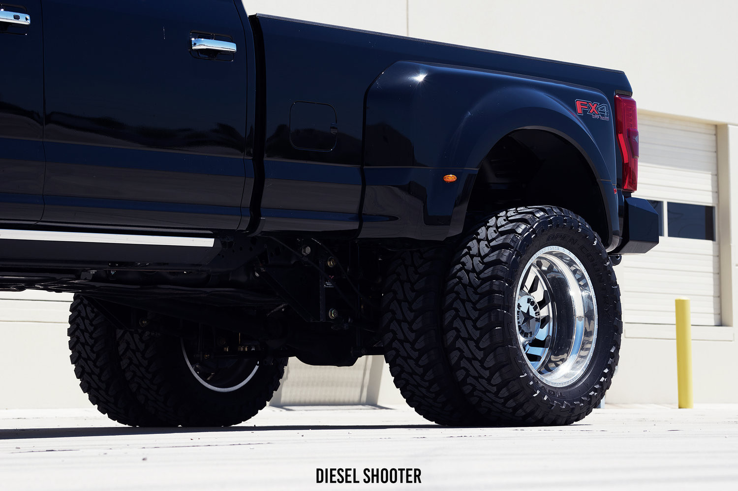 Lifted Ford Super Duty on 37 Inch Toyo Tires - Photo by Diesel Shooter