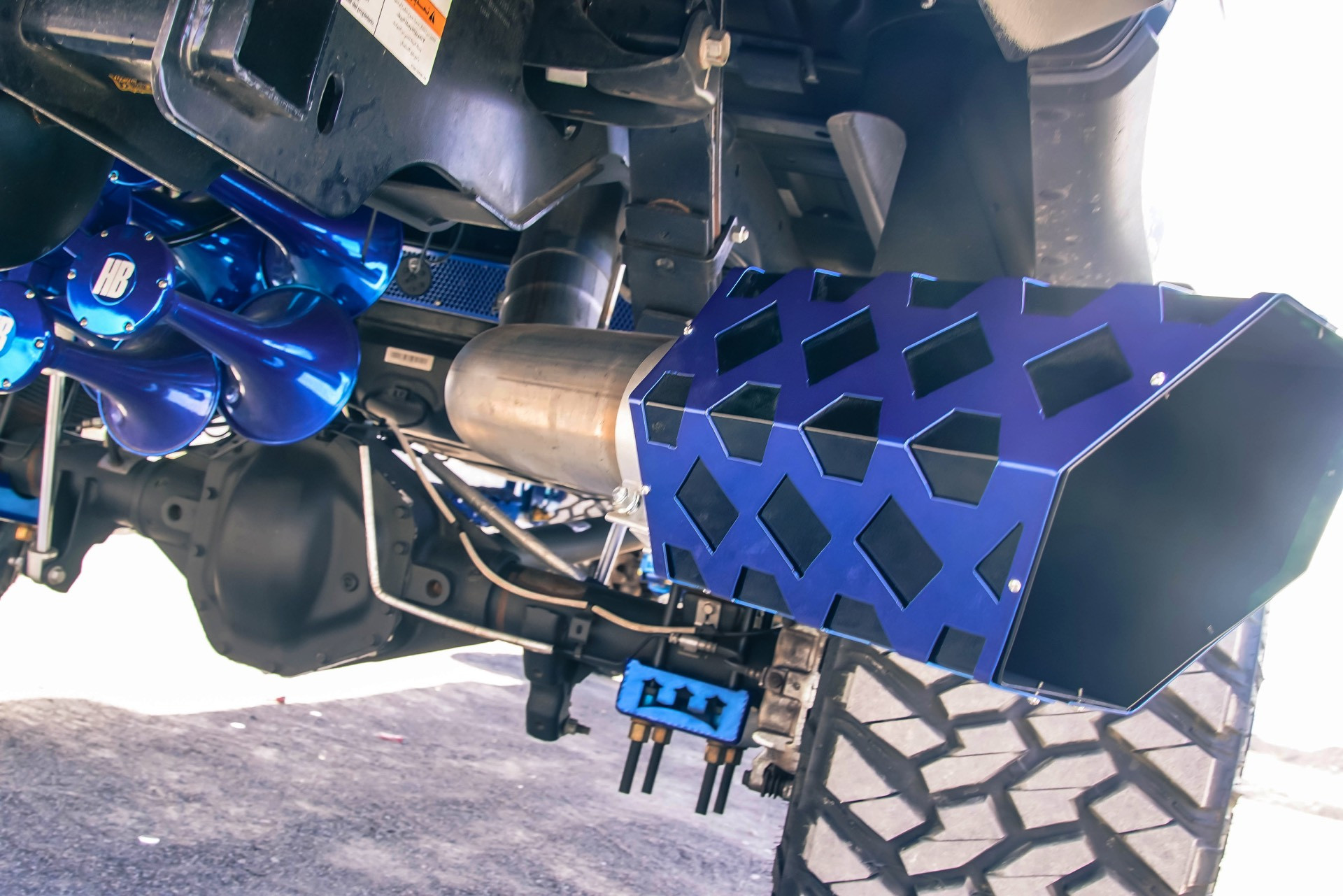 Black Lifted Ford F-350 with Custom Exhaust System - Photo by TIS Wheels