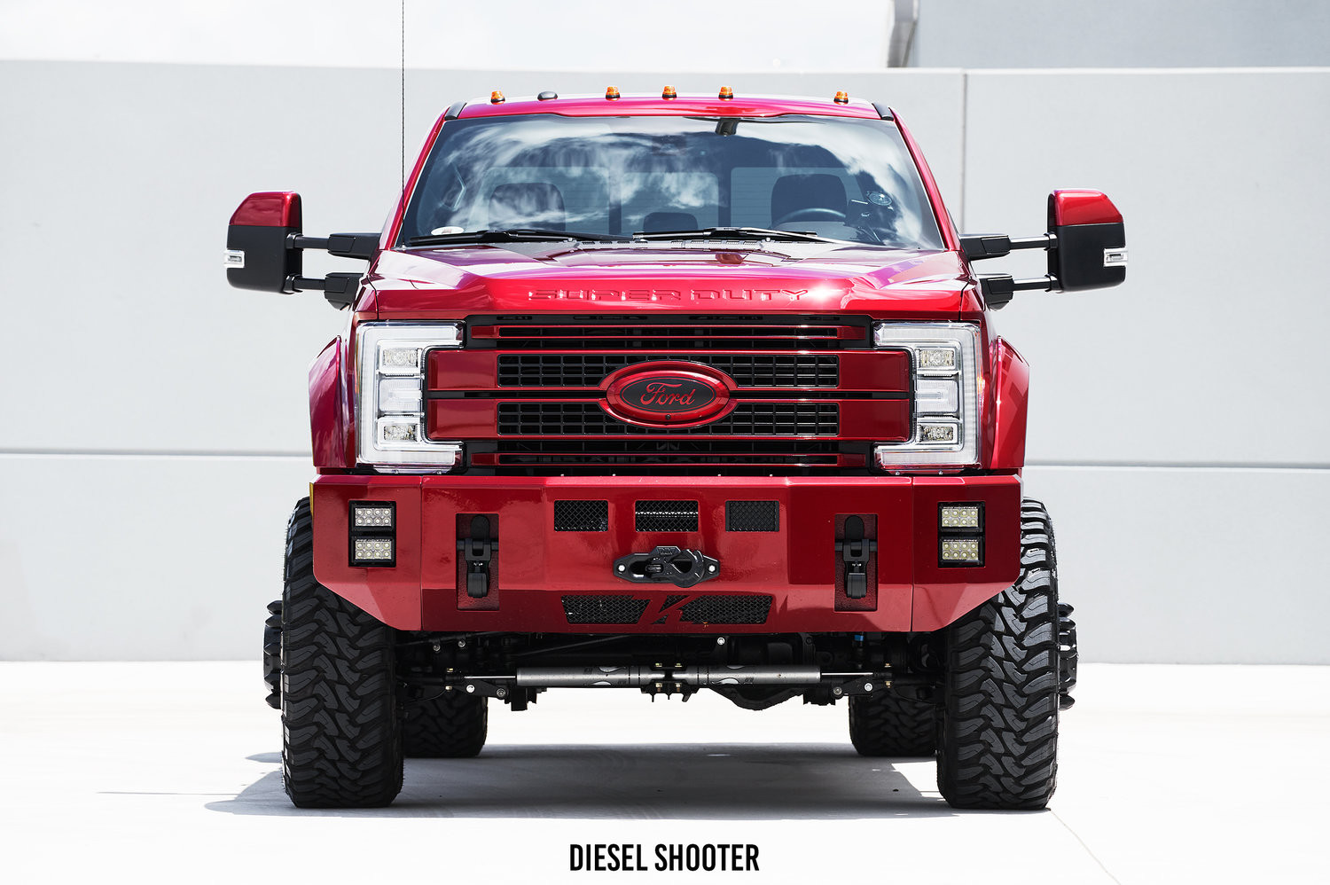Rigid Off-Road LED lights on Ruby Red Metallic Ford F-450 - Photo by Diesel Shooter