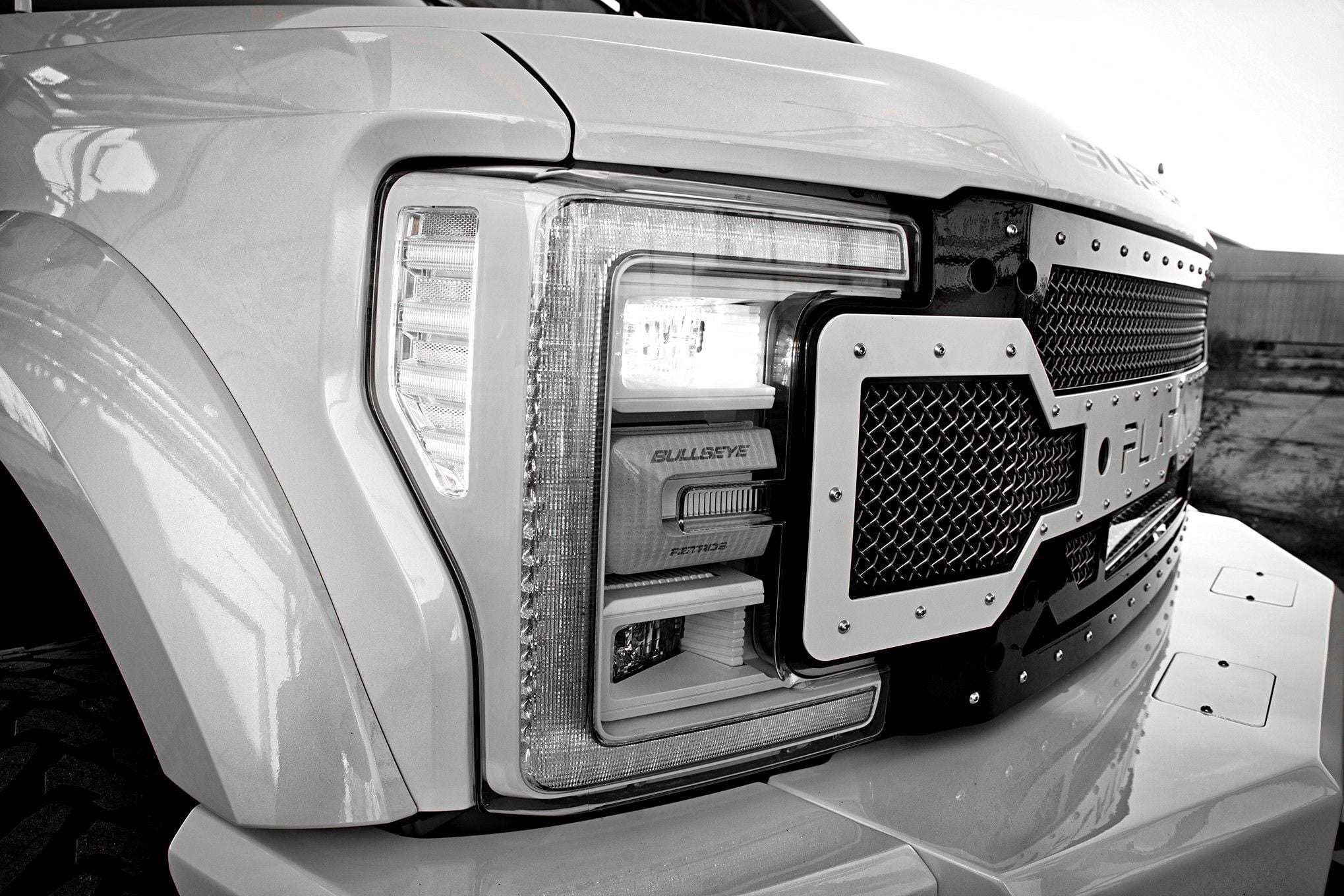 White Lifted Ford F-450 with Off-Road Front Bumper - Photo by Eddie Maloney