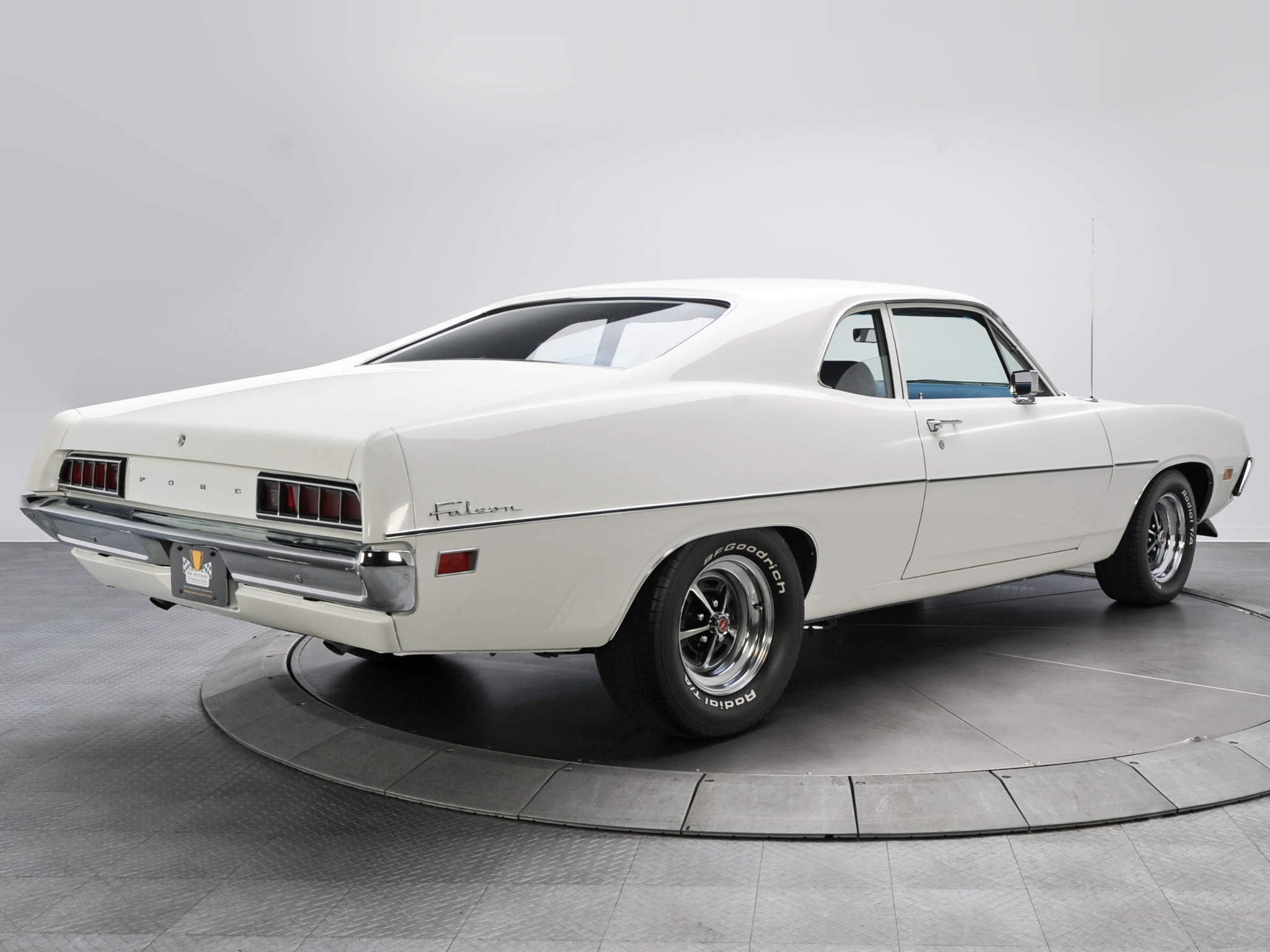 White Ford Falcon with Aftermarket Rear Spoiler - Photo by RK Motors