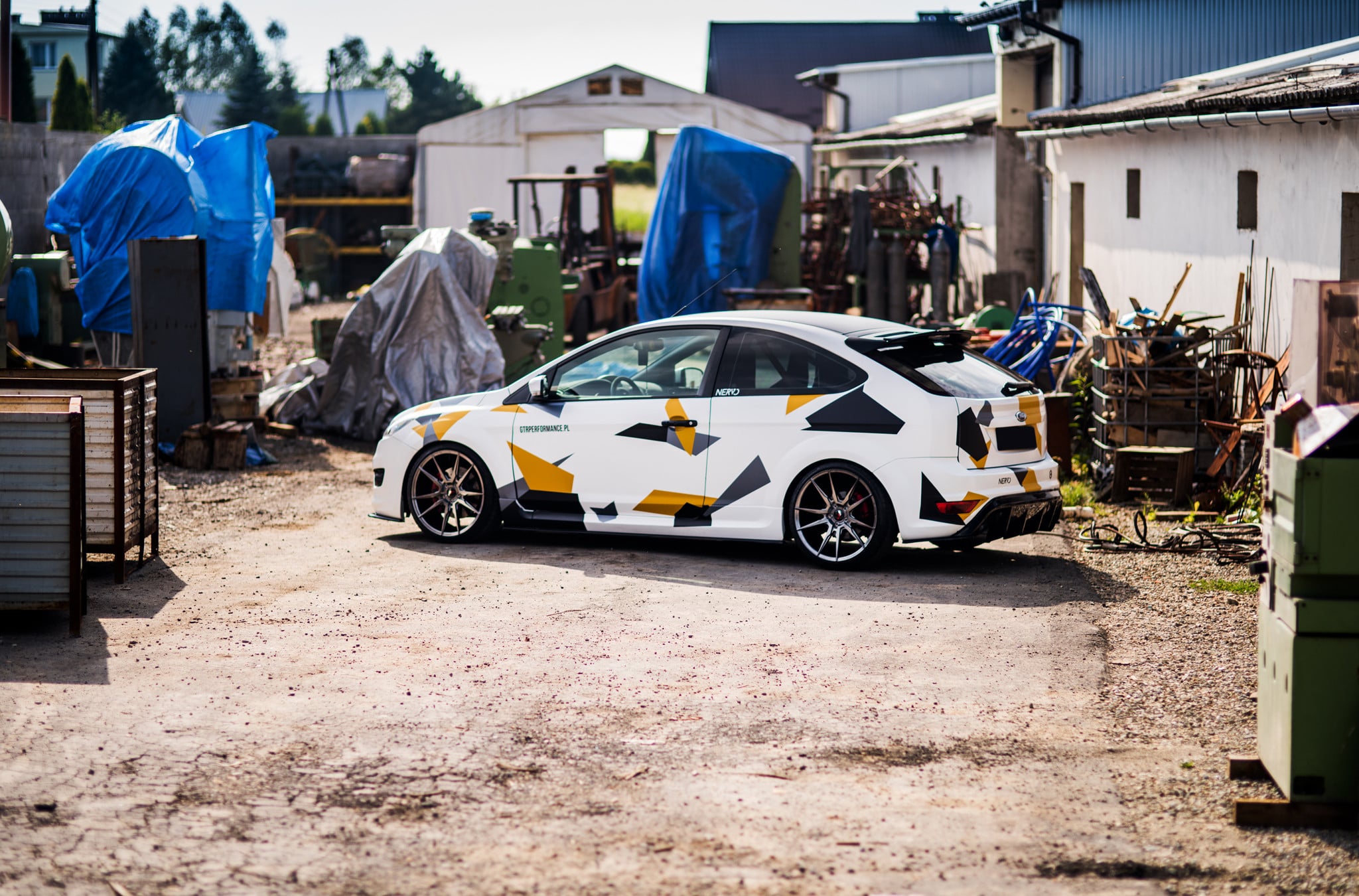 White Ford Focus with Aftermarket Side Skirts - Photo by JR Wheels