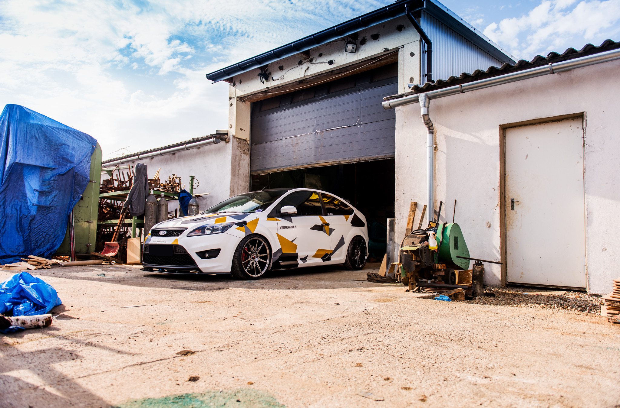 Custom Vented Hood on White Ford Focus - Photo by JR Wheels