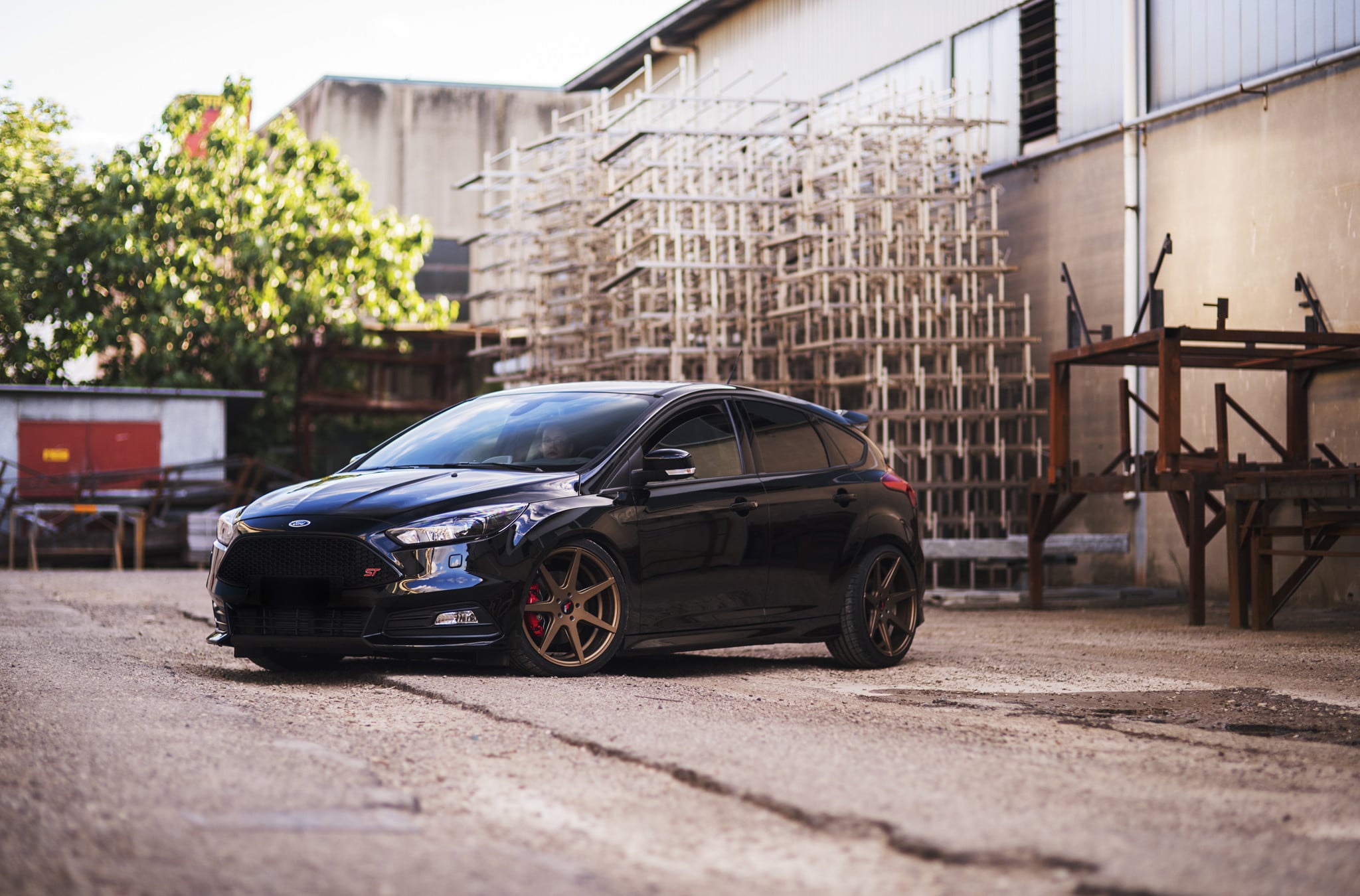 Dark Smoke Headlights on Black Ford Focus ST - Photo by JR Wheels