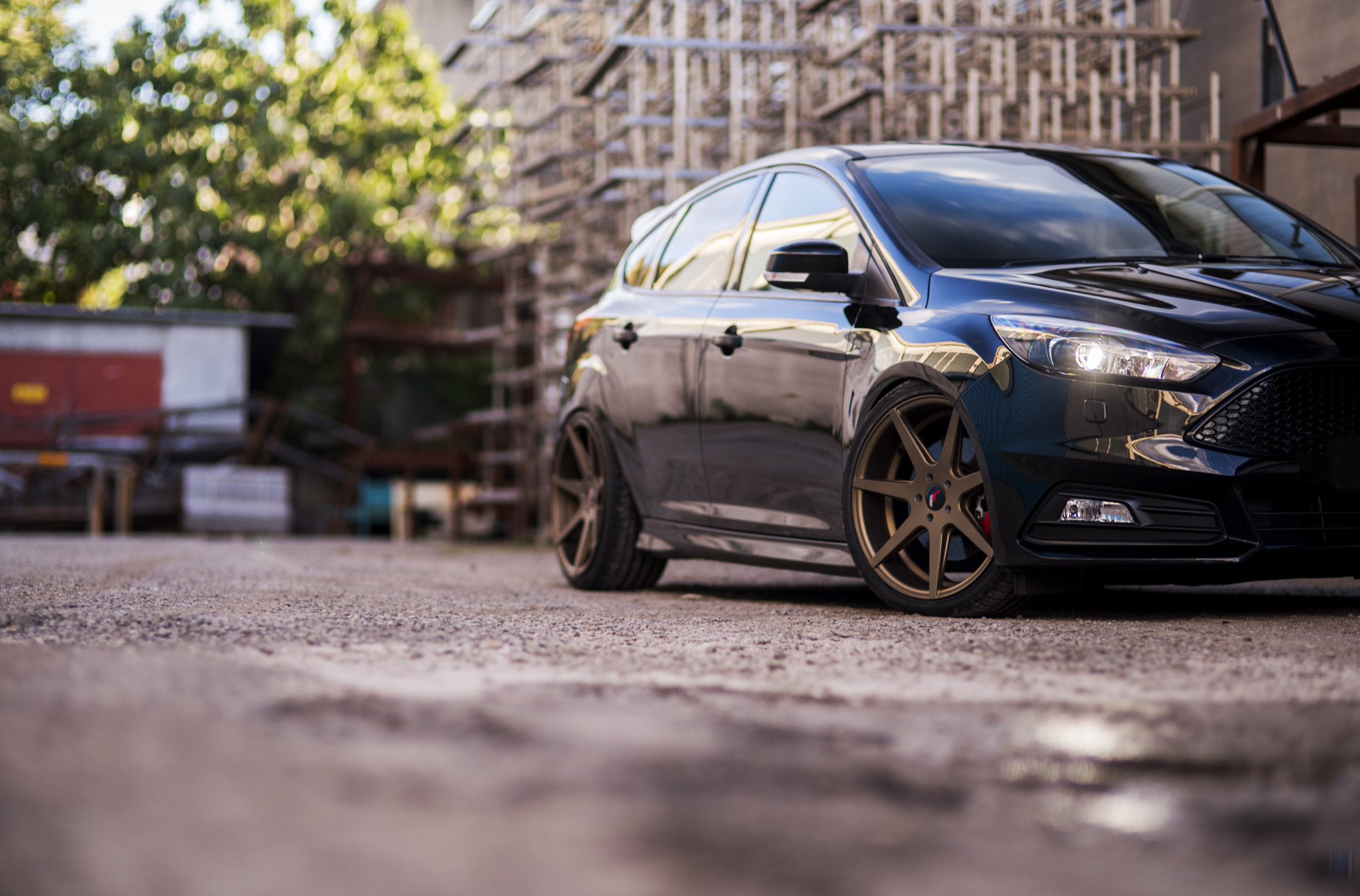 Bronze JR Wheels on Black Ford Focus - Photo by JR Wheels