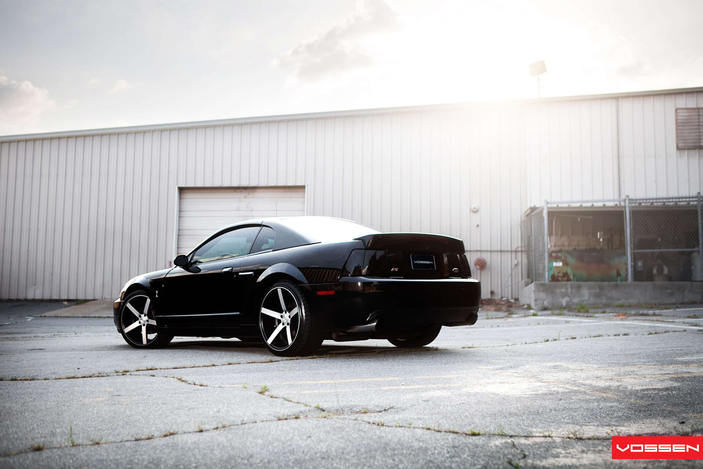 Black Ford Mustang with Custom Fender Flares - Photo by Vossen