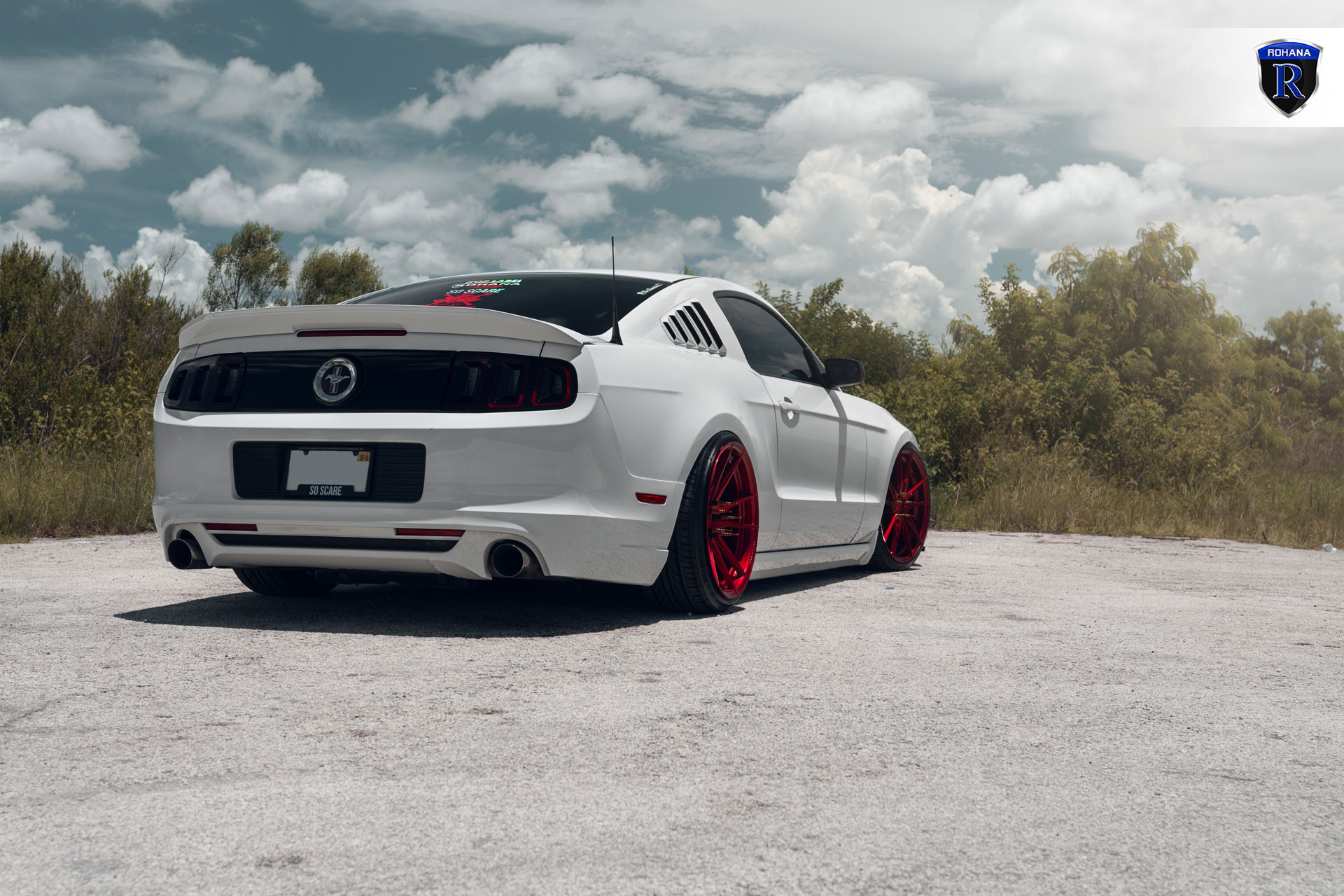 White Ford Mustang with Side Window Louvers - Photo by Rohana