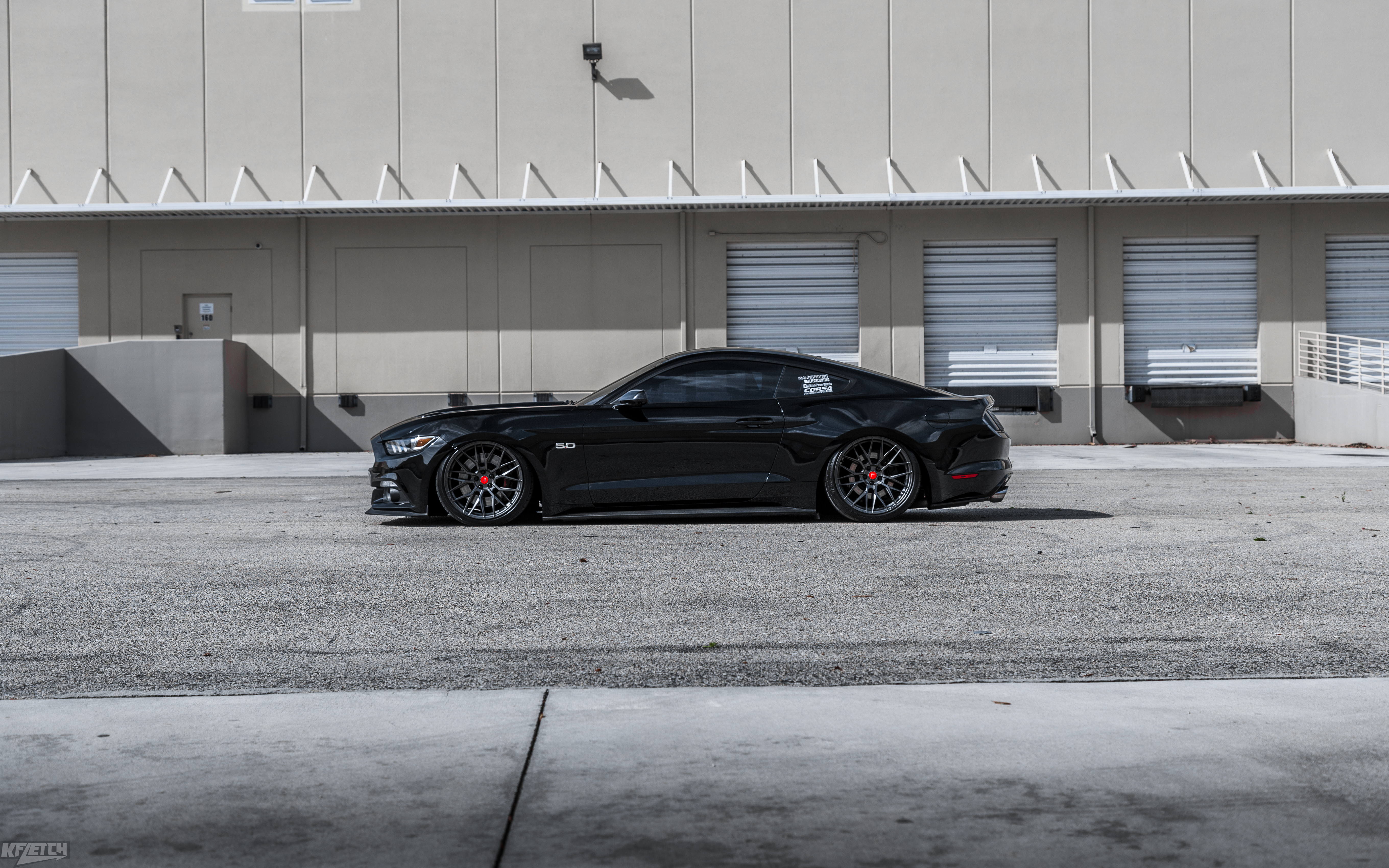 Black Ford Mustang GT with Aftermarket Side Skirts - Photo by Vorstiner