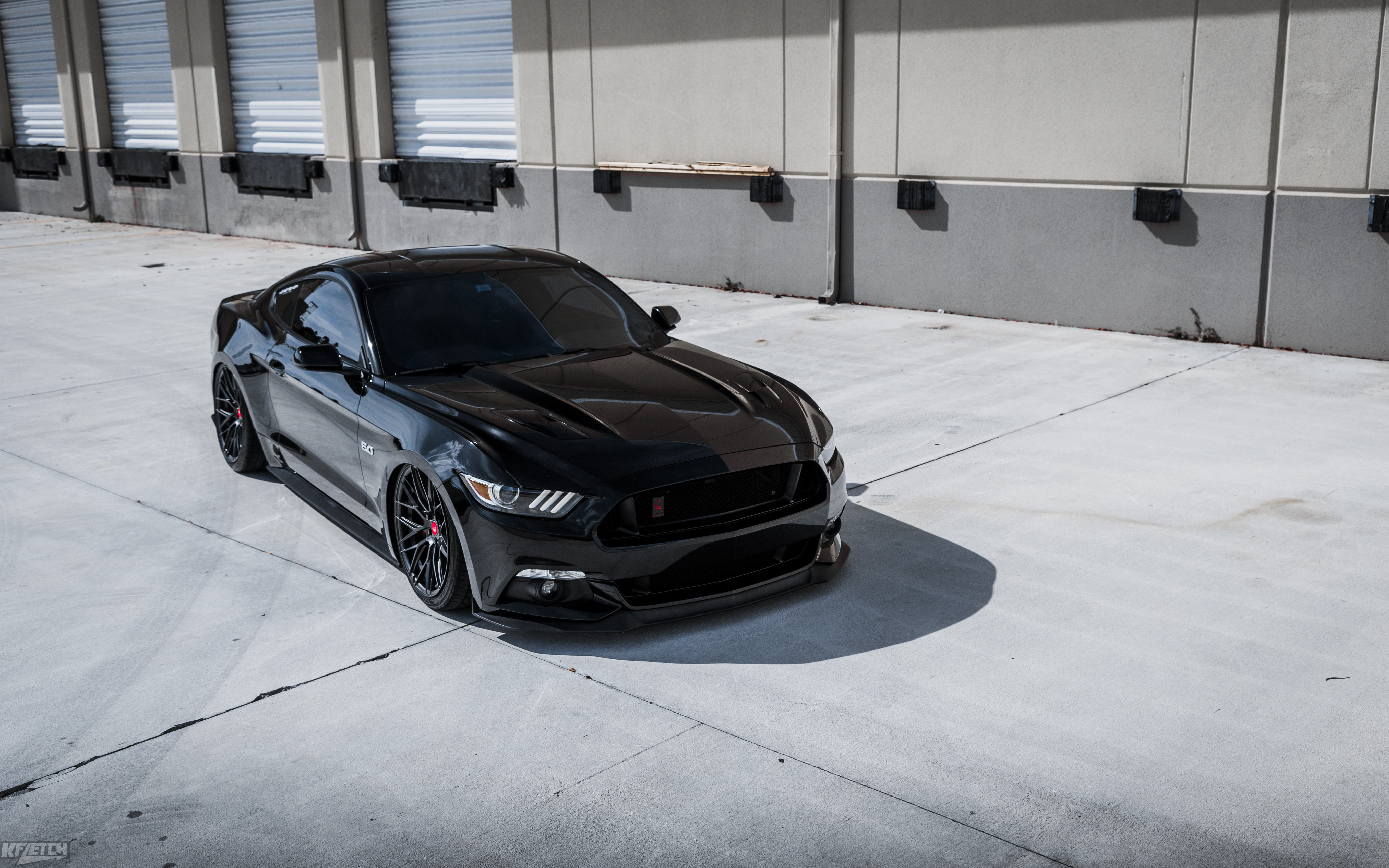 Black Ford Mustang with Custom Hood - Photo by Vorstiner