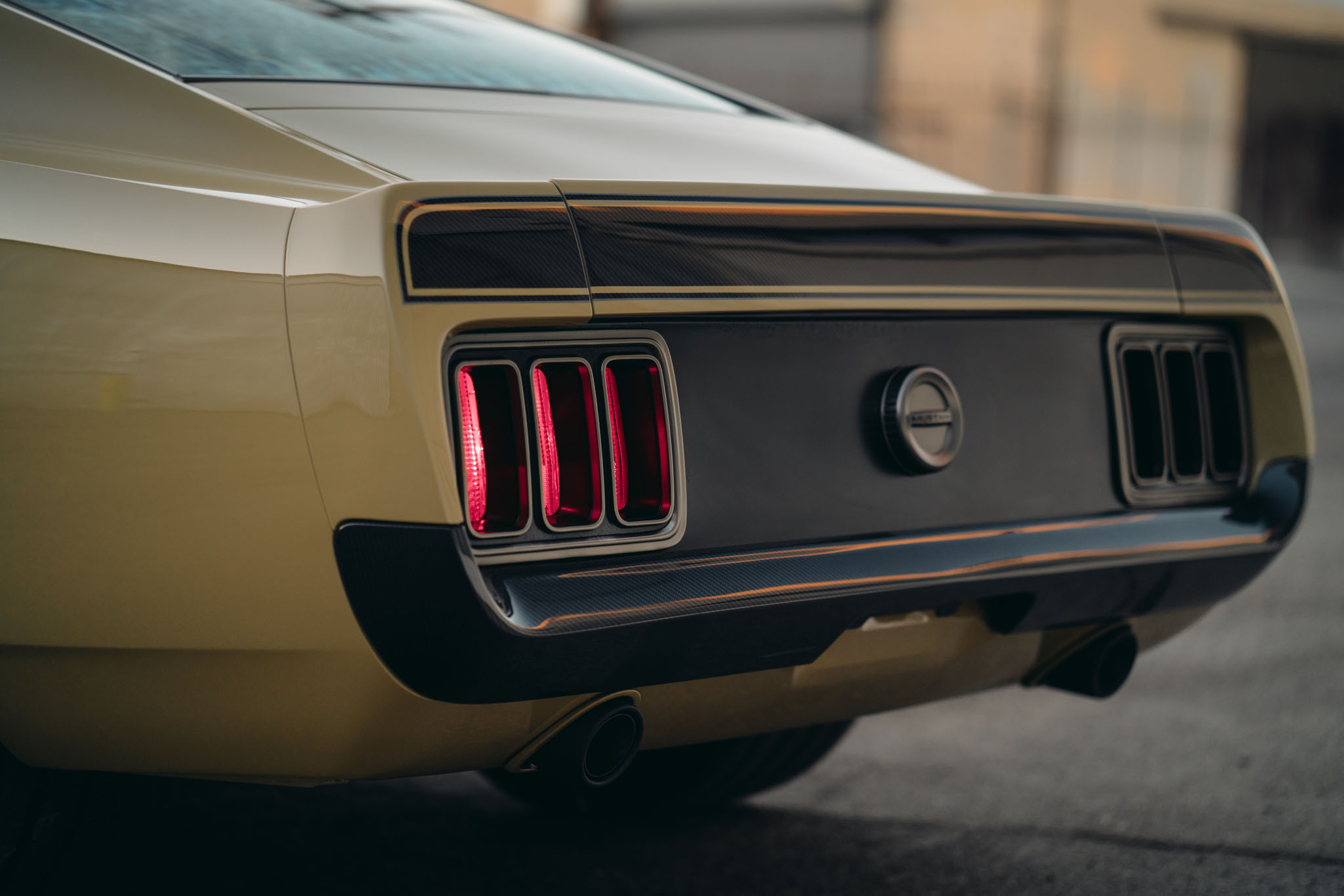 Carbon Fiber Rear Bumper on Olive Ford Mustang - Photo by HRE Wheels