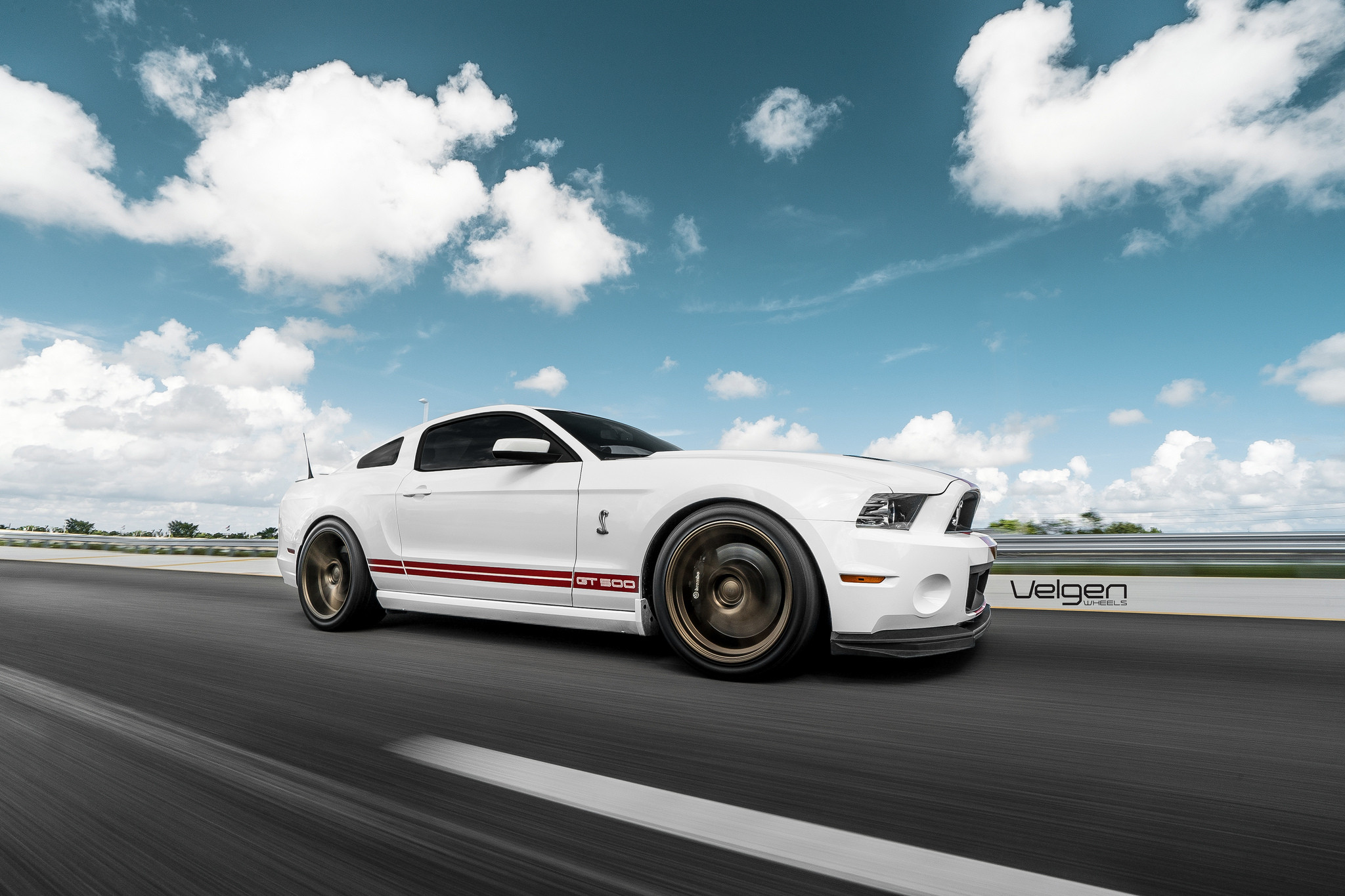 Custom Side Skirts on White Ford Mustang Shelby - Photo by Velgen