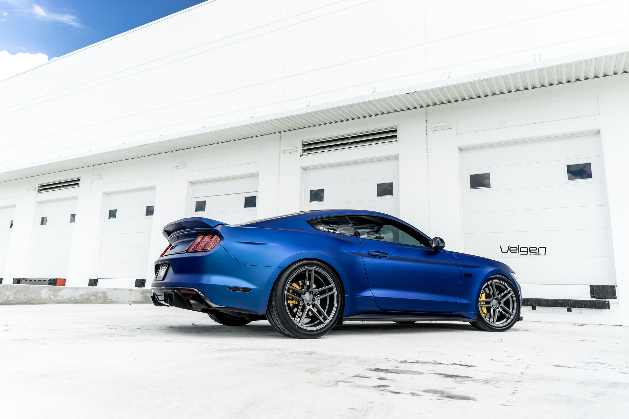Red LED Taillights on Blue Ford Mustang - Photo by Velgen