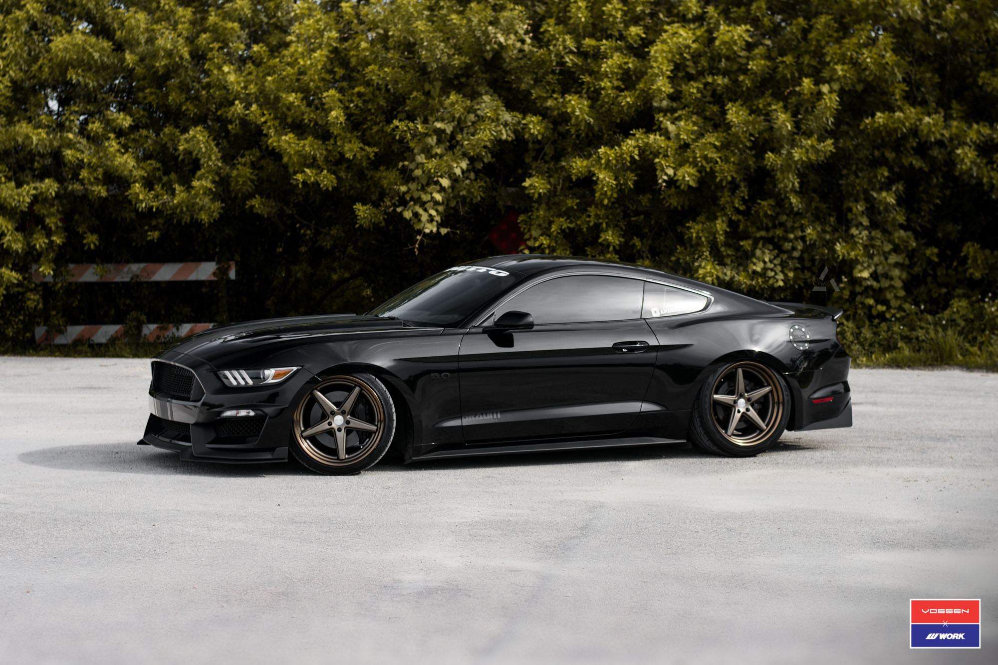 Black Ford Mustang 5.0 with Aftermarket Side Skirts - Photo by Vossen