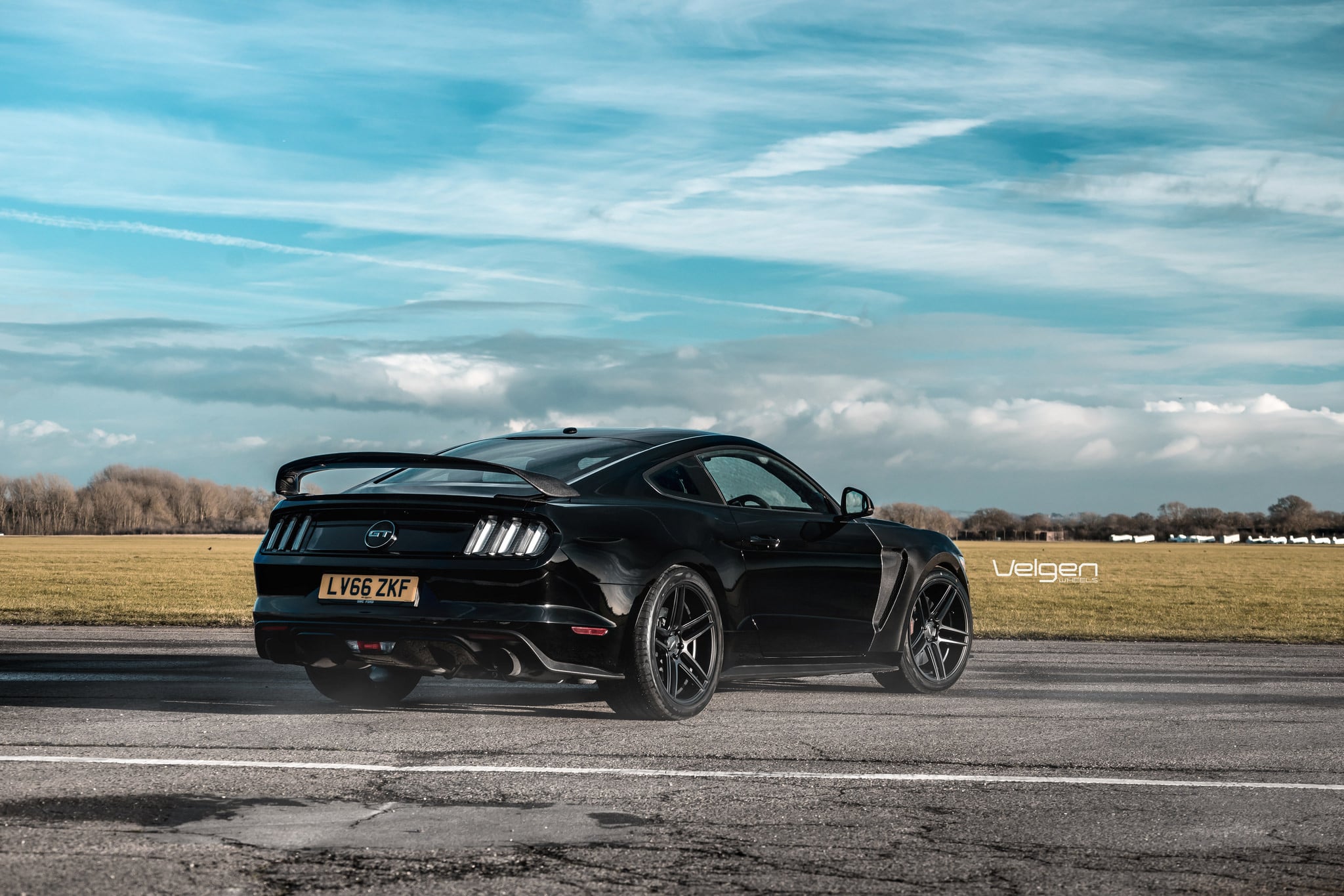 Aftermarket Rear Diffuser on Black Ford Mustang GT - Photo by Velgen