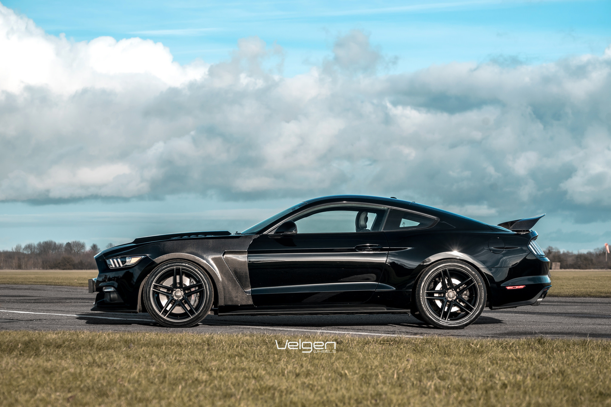 Black Ford Mustang with Yokohama Advan Tires - Photo by Velgen