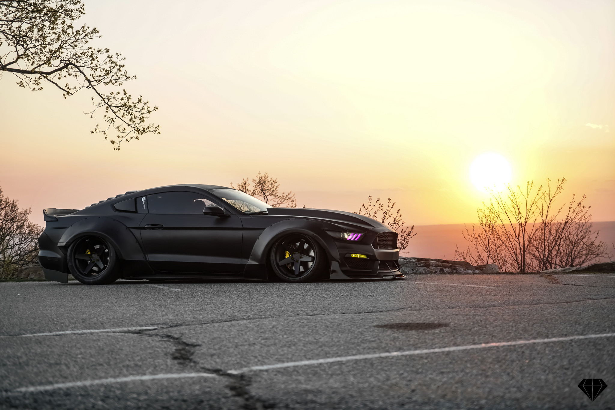 Matte Black Ford Mustang with Color LED Headlights - Photo by Blaque Diamond Wheels