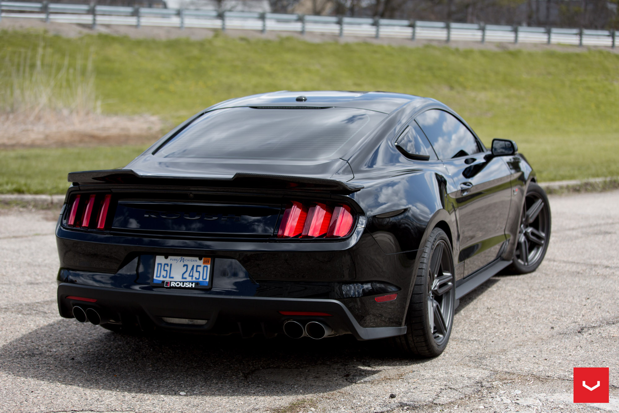 Carbon Fiber Rear Lip Spoiler on Black Ford Mustang Roush - Photo by Vossen
