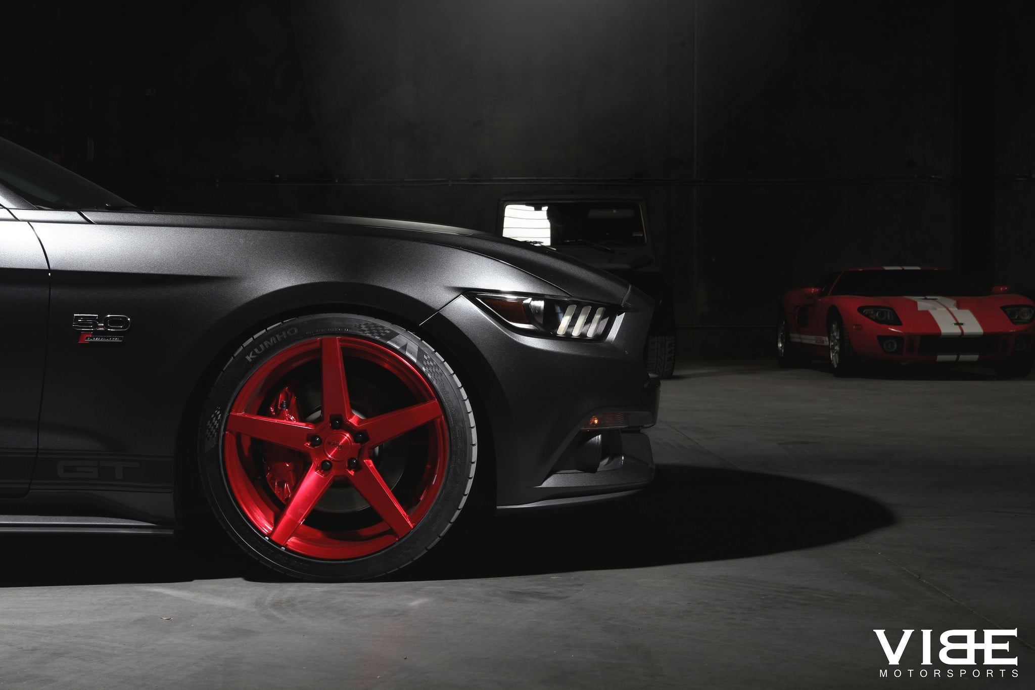 Red Custom Wheels on Ford Mustang GT - Photo by Vibe Motorsports