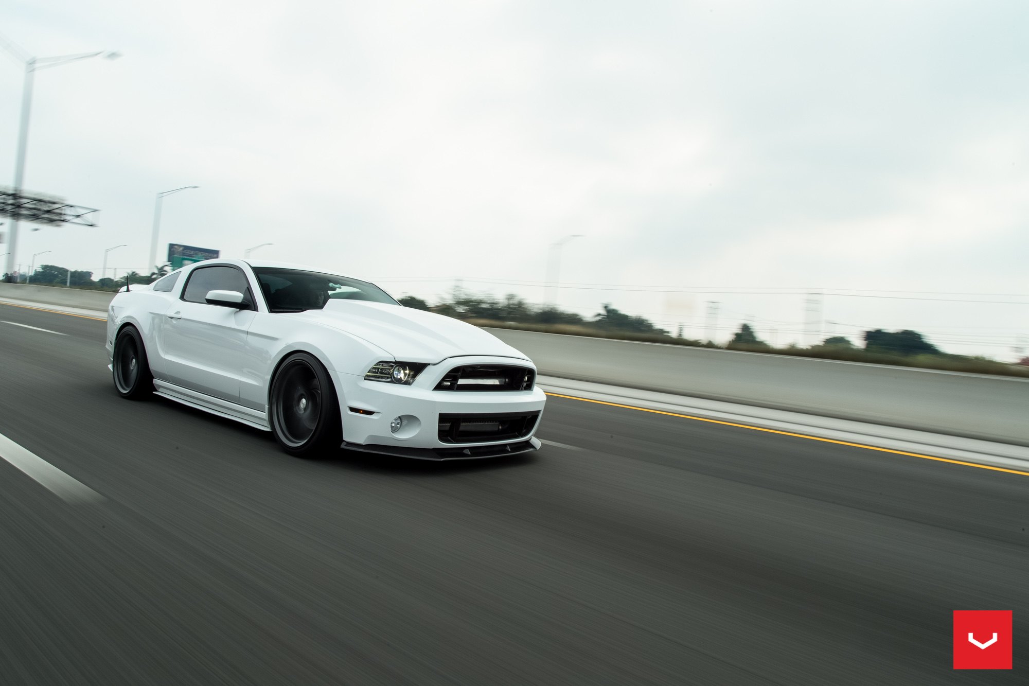 Stanced Ford Mustang on Graphite VFS-5 Custom Rims - Photo by Vossen.