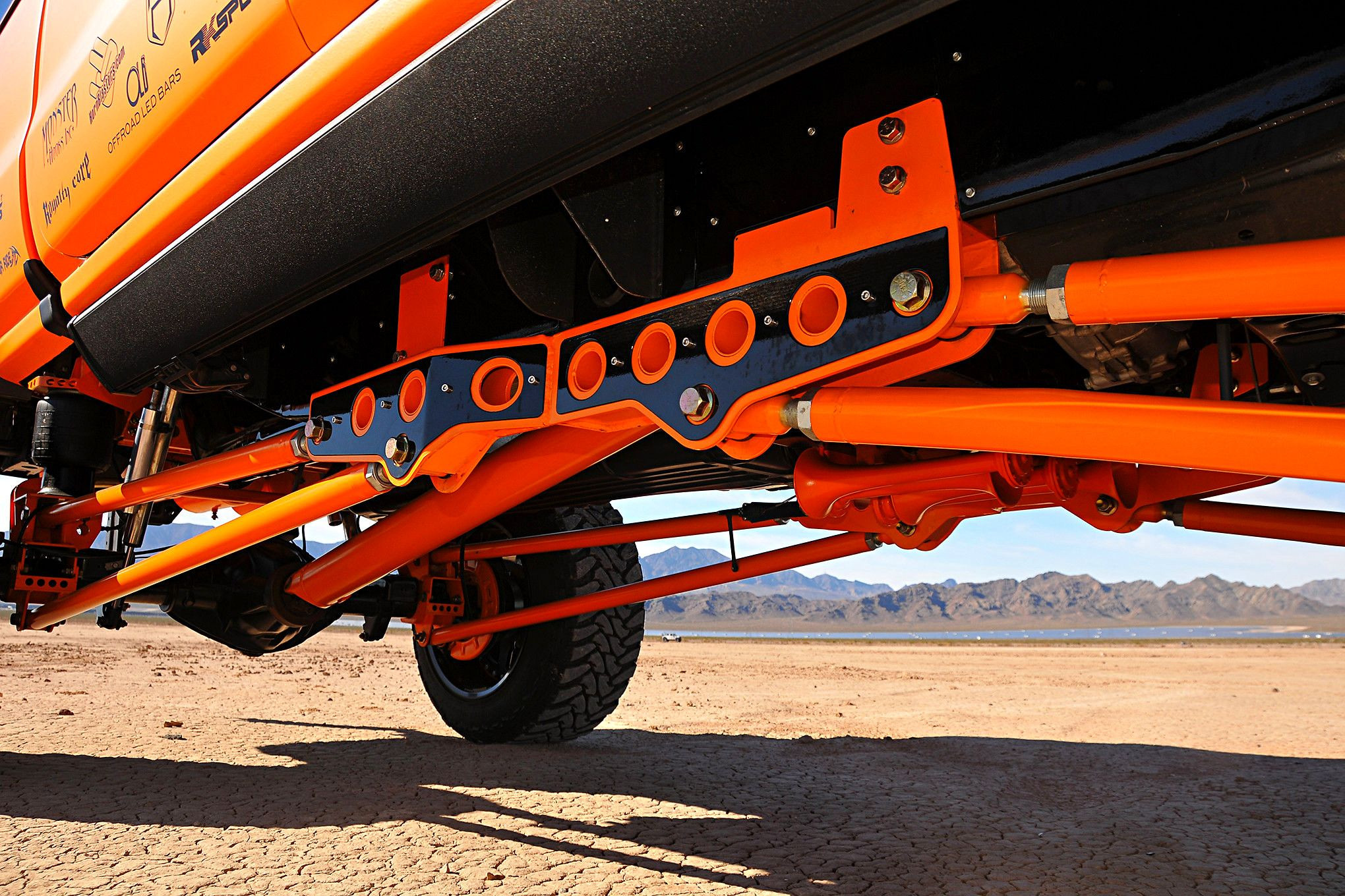 Powdercoated Orange Lift Kit on GMC Sierra - Photo by Phil Gordon