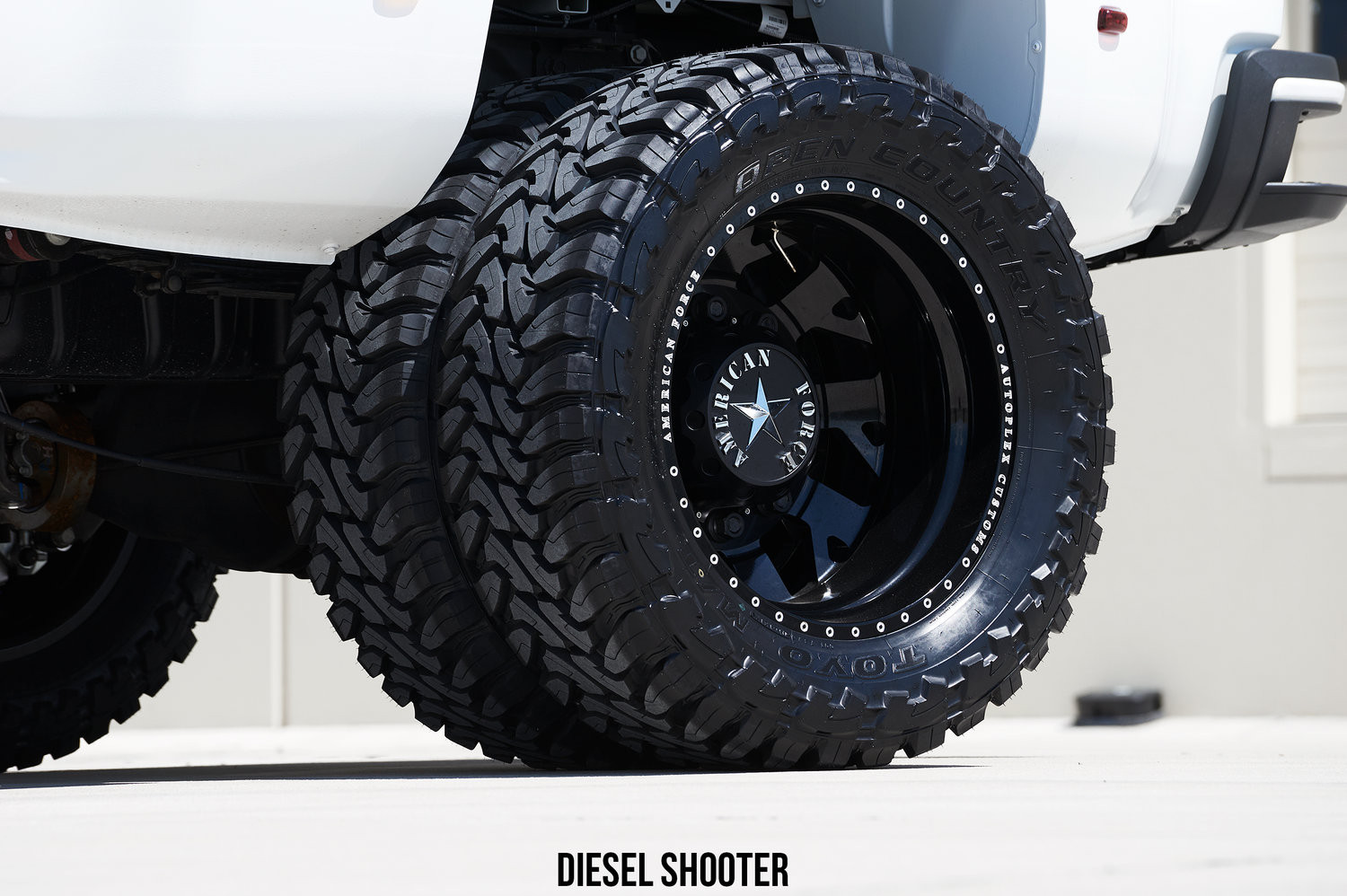 Custom GMC Sierra on Dually Toyo Tires - Photo by Diesel Shooter