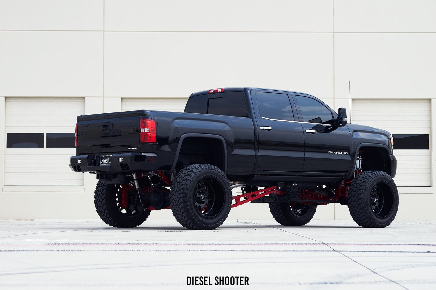 Black GMC Sierra Denali with AMP Research Power Steps - Photo by Diesel Shooter