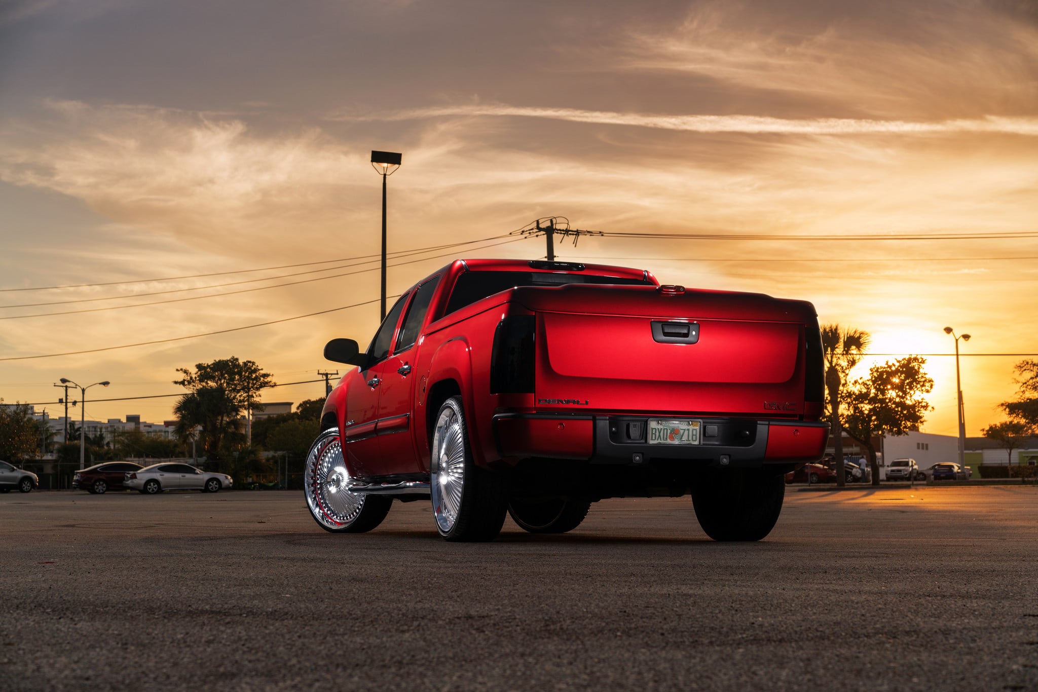 Custom Taillights on Red GMC Sierra - Photo by DUB