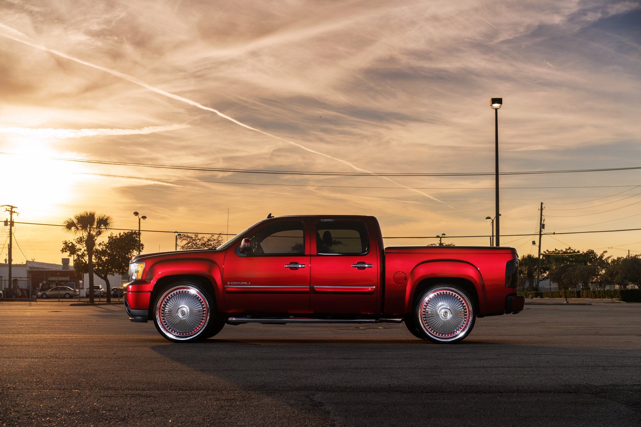 Candy Red GMC Sierra on DUB Spinners Wheels.
